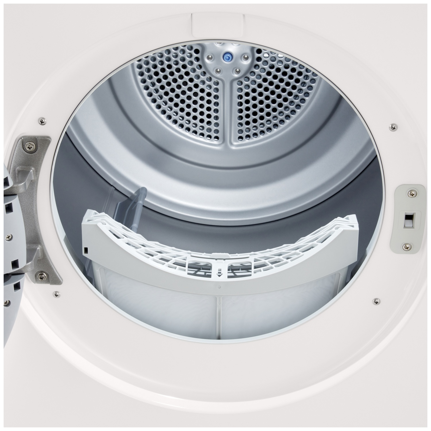 Interior of a white dryer drum with a white lint filter in the foreground.