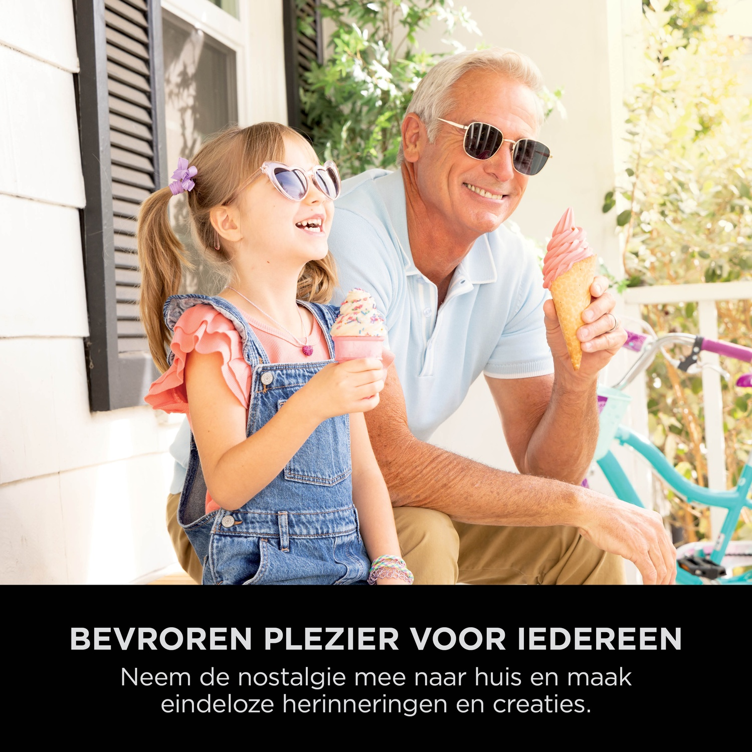 A man and child enjoy ice cream on a porch with a bicycle behind them.