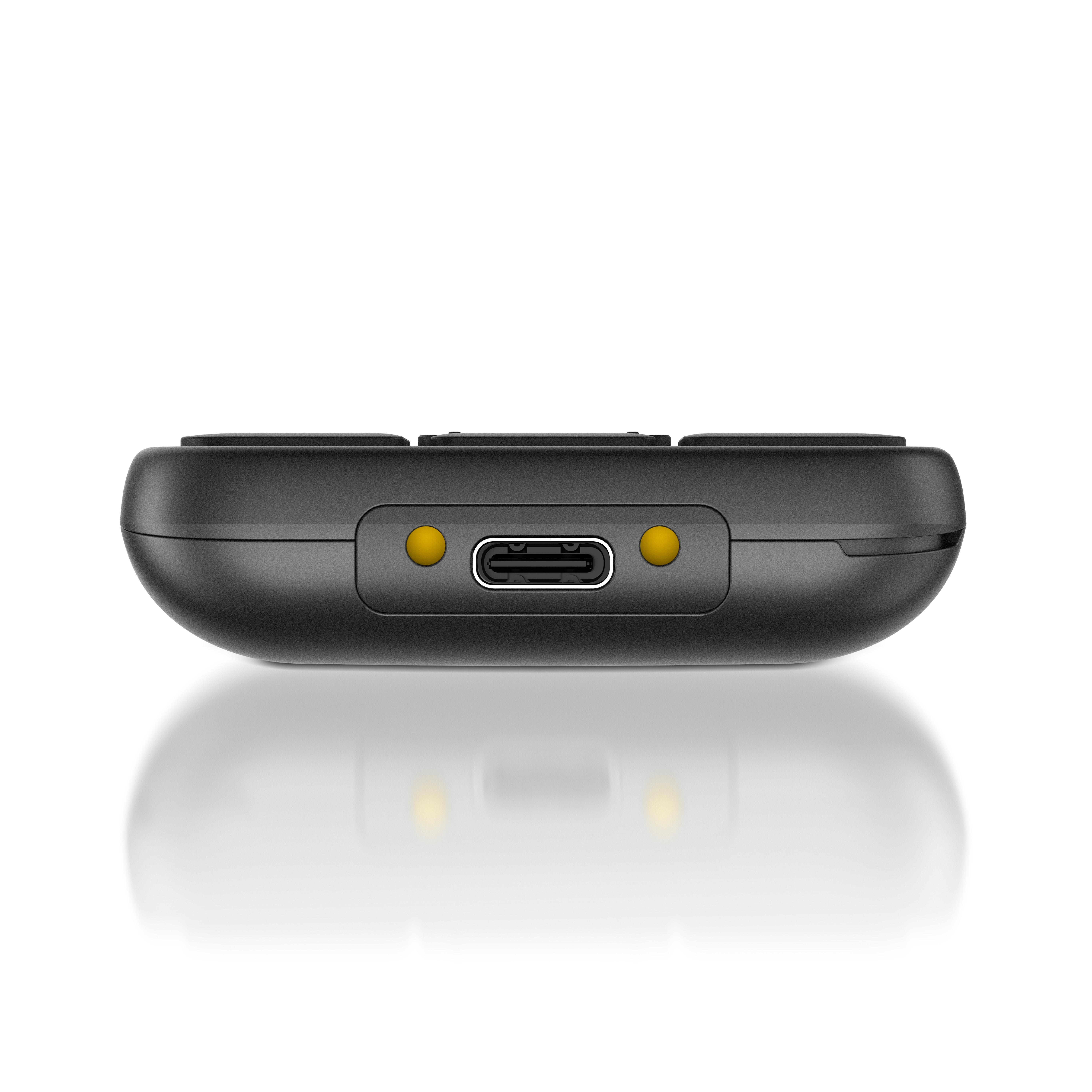 Ein schwarzes Gerät mit einem USB-C-Anschluss und zwei gelben Punkten.