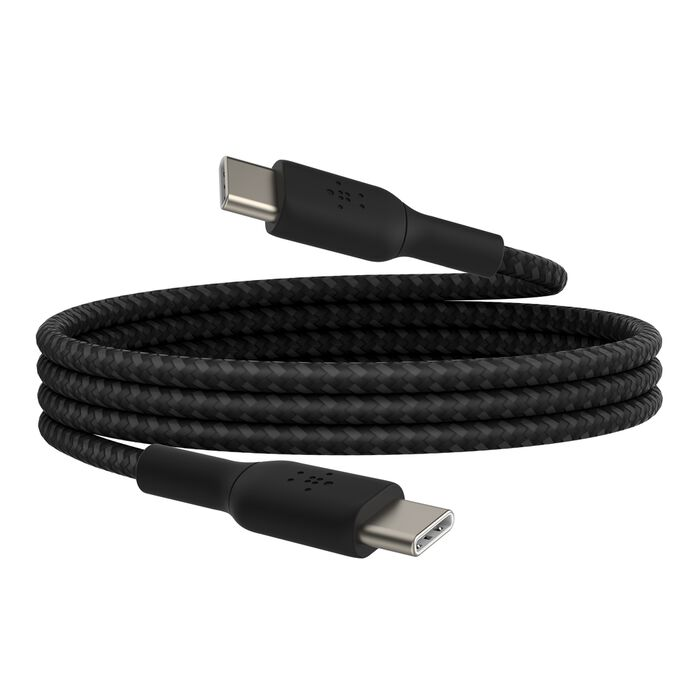 Un cable USB-C negro enrollado con dos conectores sobre fondo blanco.
