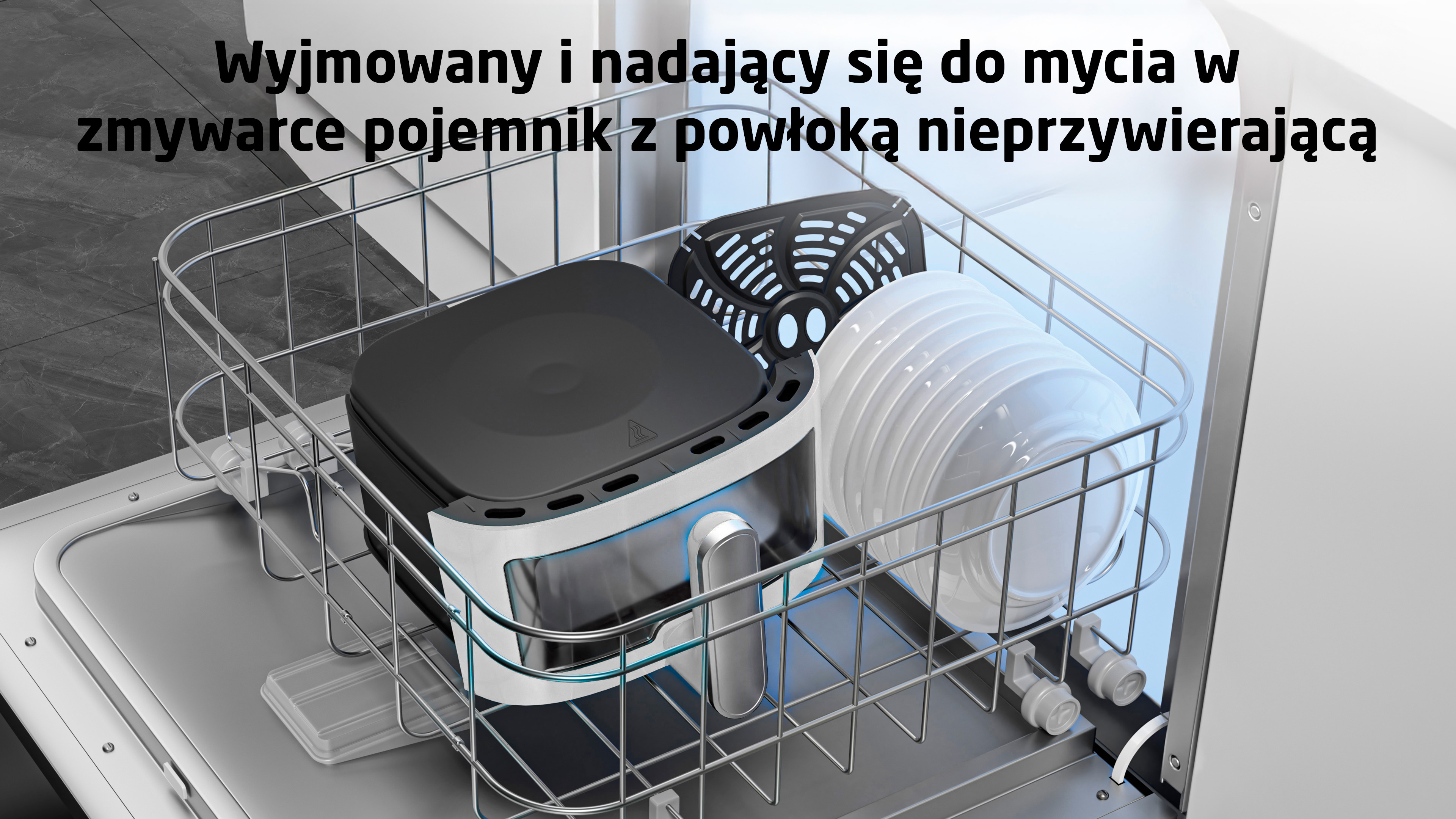 Frytkownica i białe talerze w zmywarce.