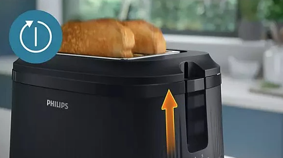 Czarny toster Philips z dwoma kromkami tostowymi i ikoną timera.