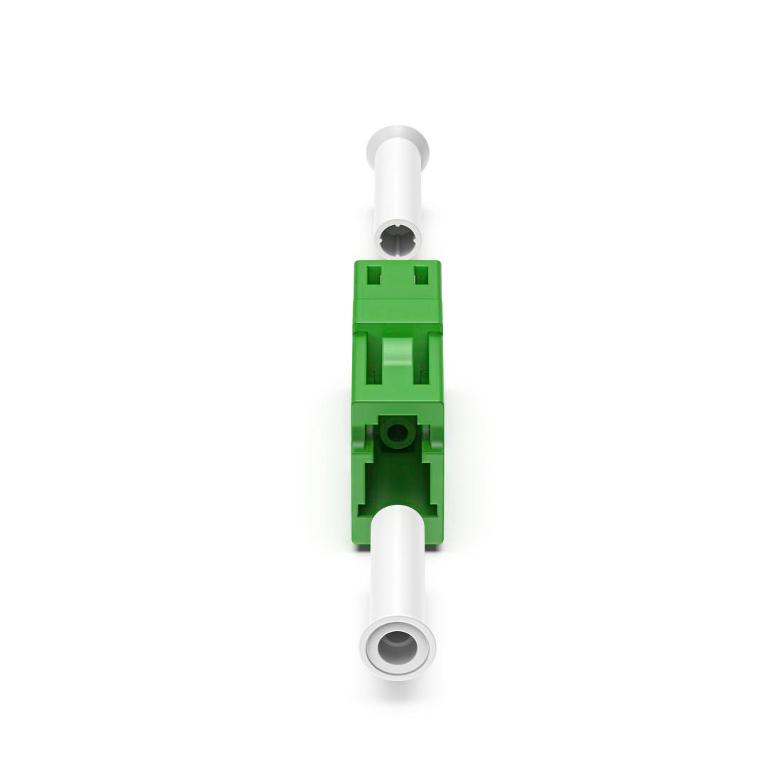 Grüner Stecker mit zwei weißen Röhren, die vorne und hinten verbunden sind.