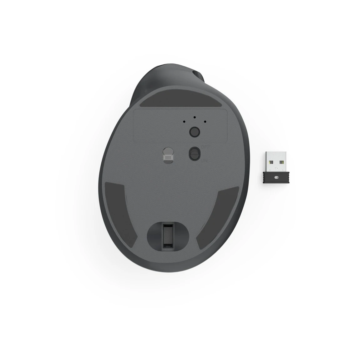 Spód ciemnej myszy z donglem USB obok.