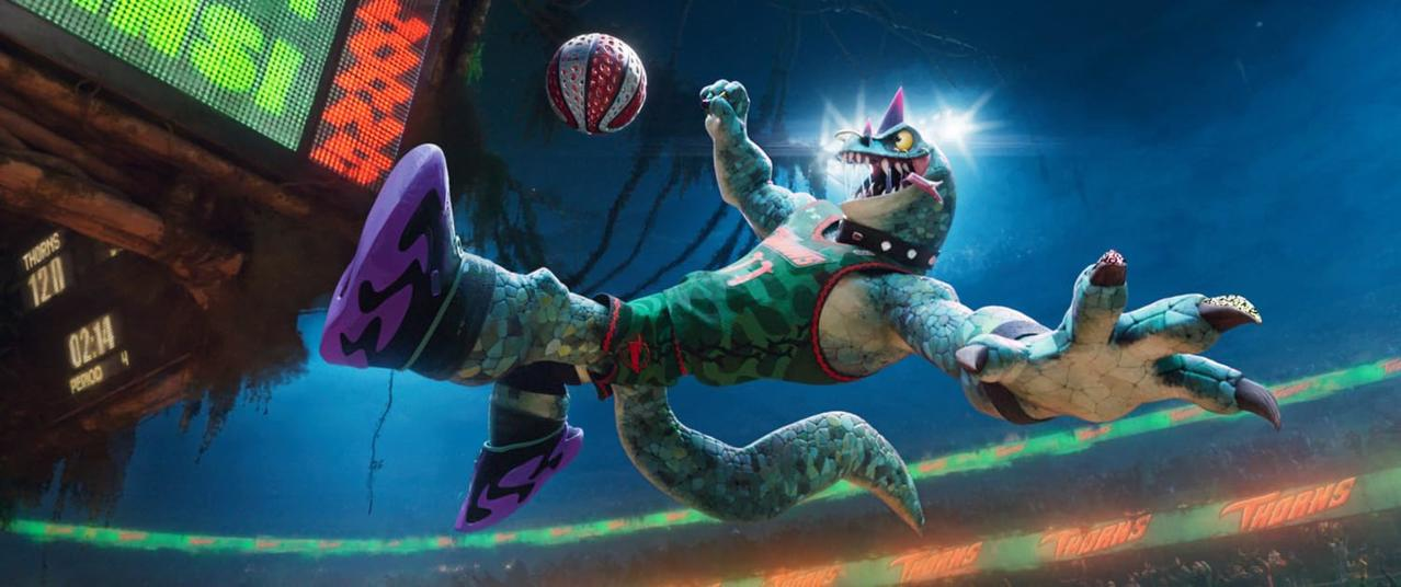 Ein Dinosaurier spielt Basketball, wirft den Ball in die Luft, trägt ein Trikot und lila Schuhe.