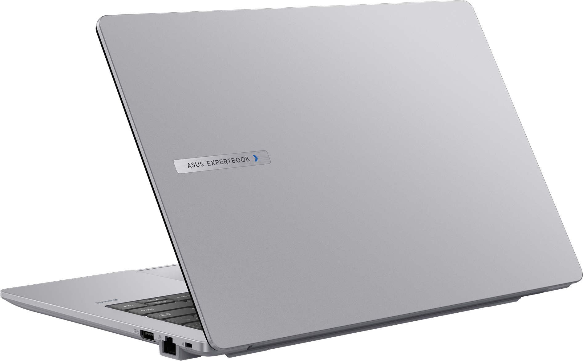 Un ordinateur portable ASUS ExpertBook argenté est ouvert, montrant son clavier et ses ports.