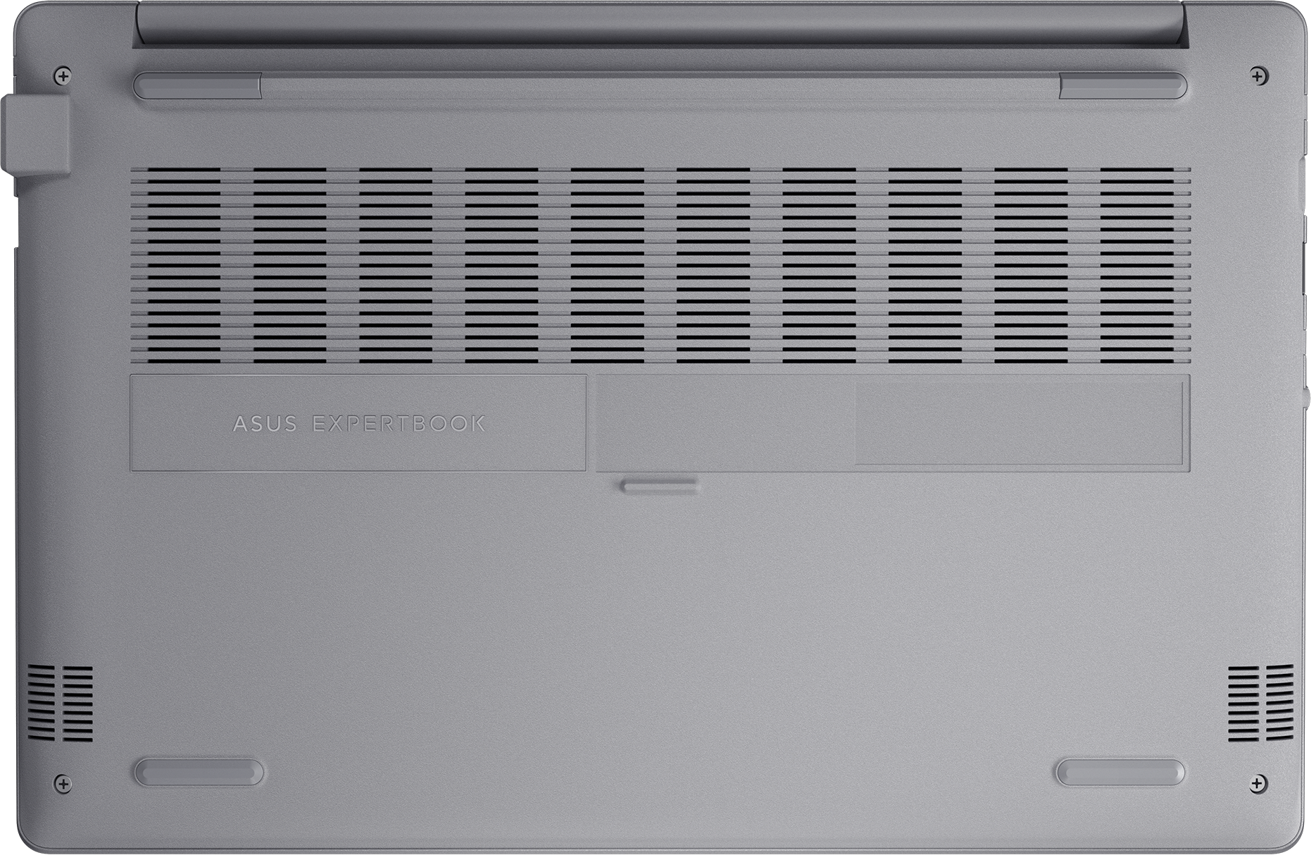 Dessous d'un ordinateur portable argenté, montrant des évents et le logo ASUS EXPERTBOOK.