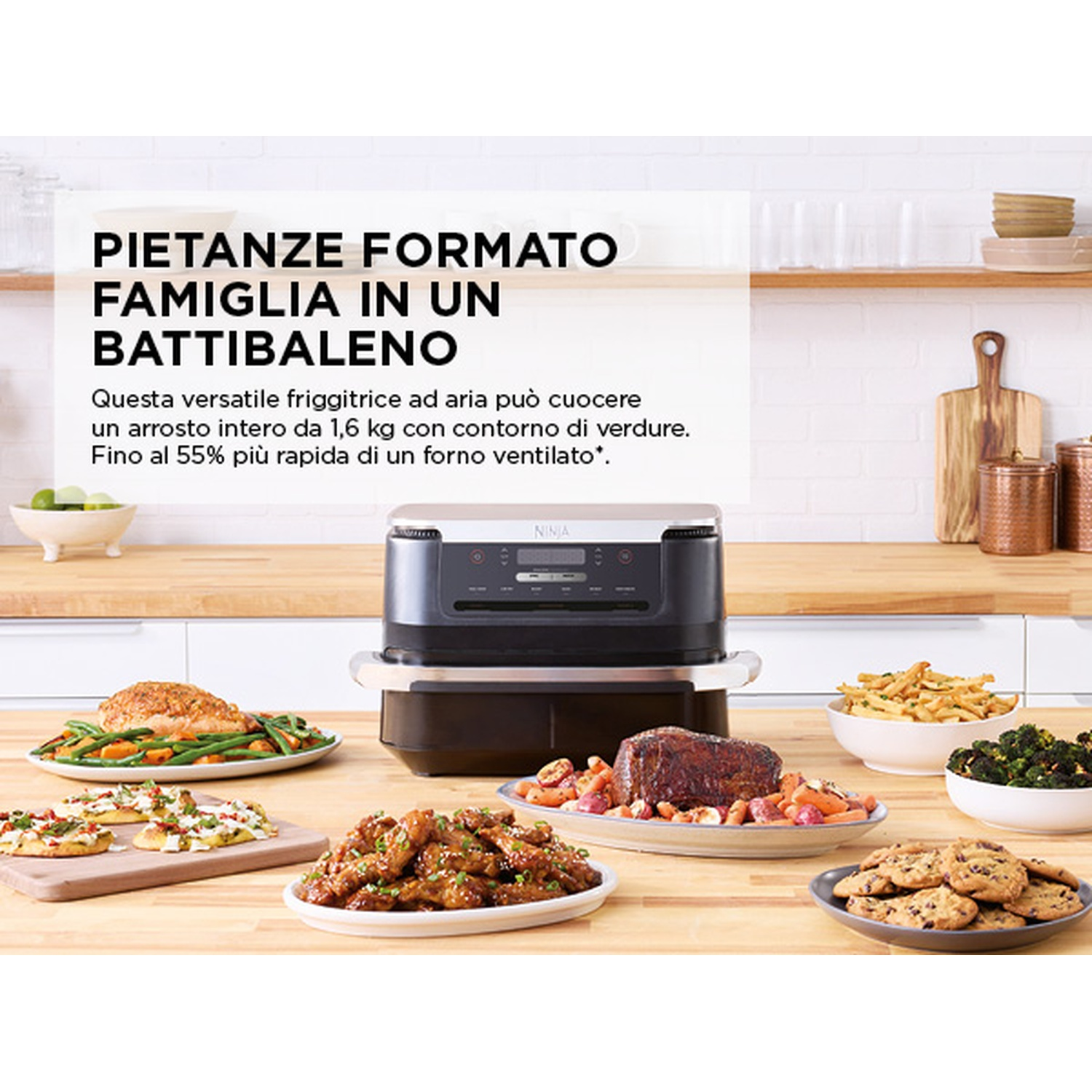 Friteuse ad aria con pasti per famiglie: arrosto, pizza, patatine, verdure, biscotti.