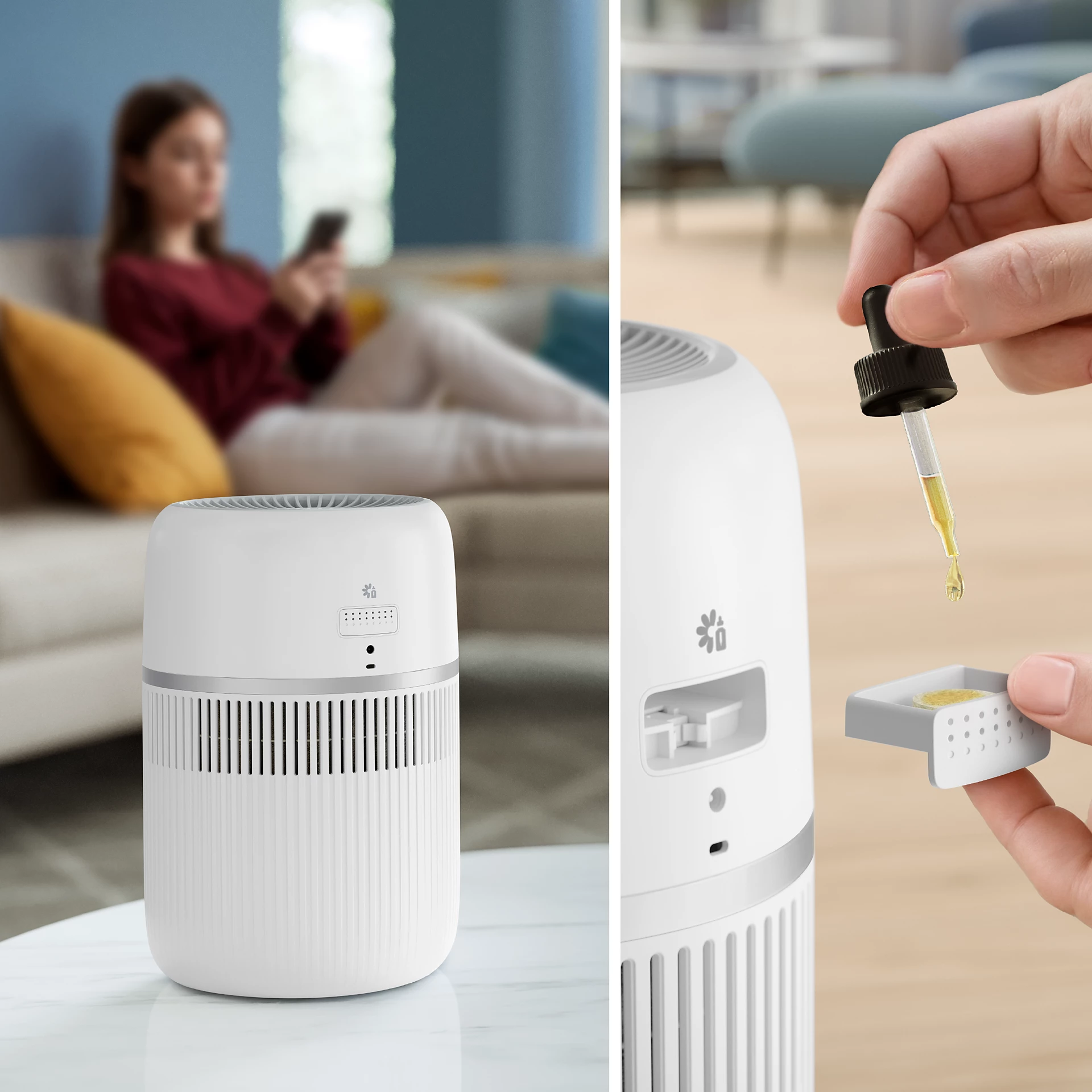Un purificateur d'air blanc sur une table, avec une main ajoutant des gouttes à un insert.