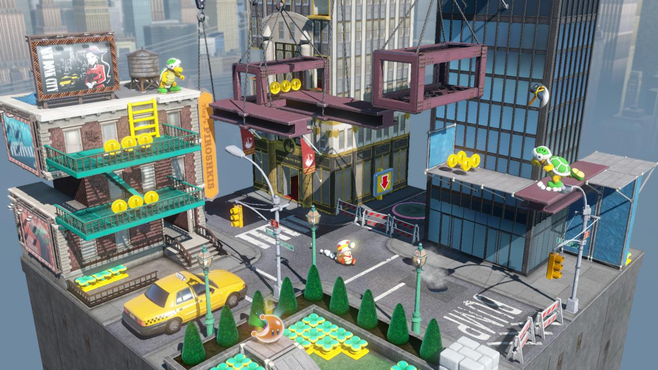 Miniaturowa scena miejska z budynkami, żółtą taksówką, Koopa Troopami i Toad.