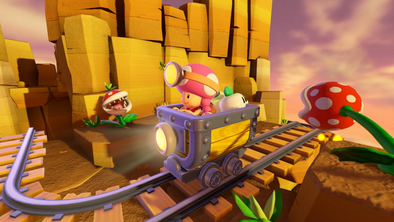 Toad jedzie w wózku kopalnianym po torach przez skalisty krajobraz z roślinami Piranha.