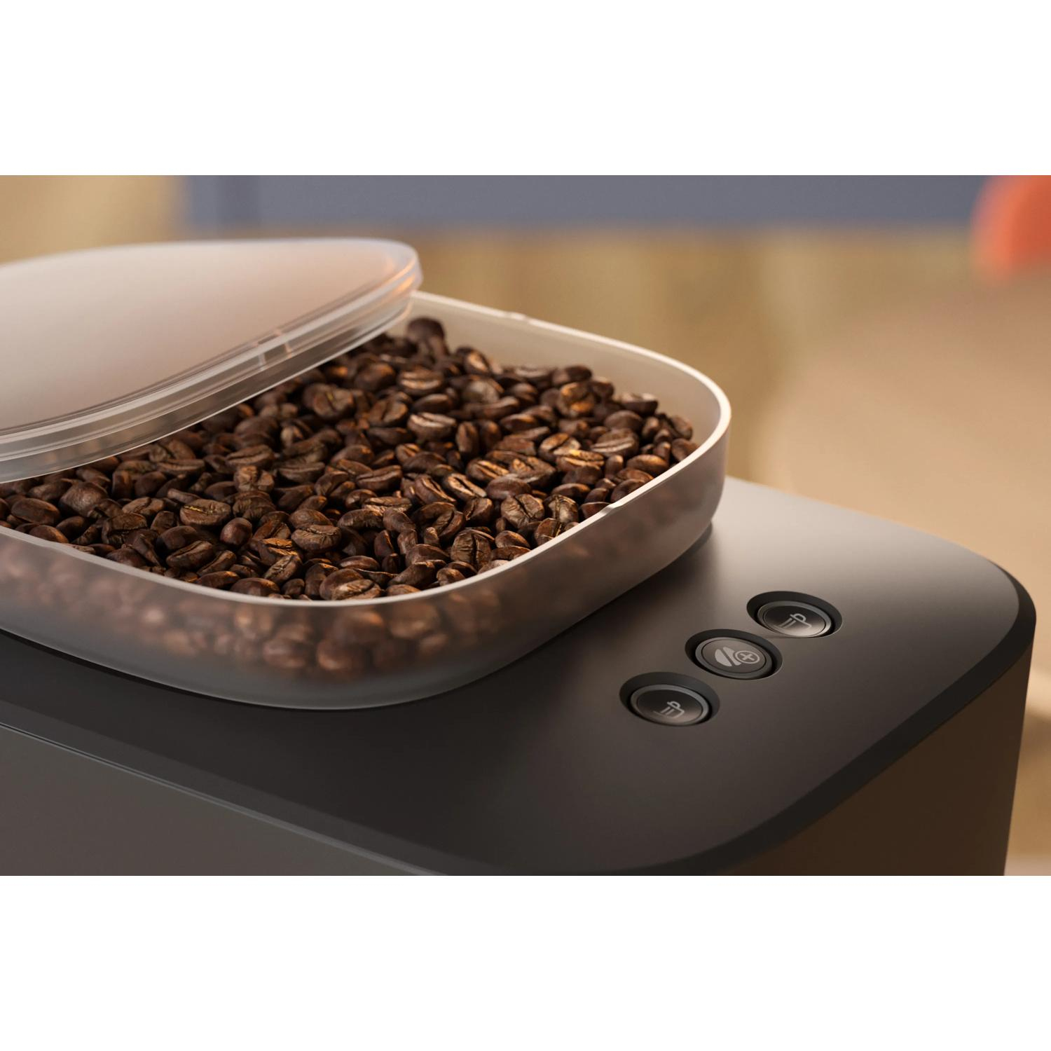 Máquina de café con depósito de granos y botones de control.