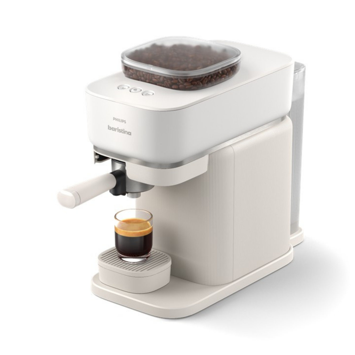 Cafetera blanca con depósito de cristal lleno de granos y un espresso en vaso.