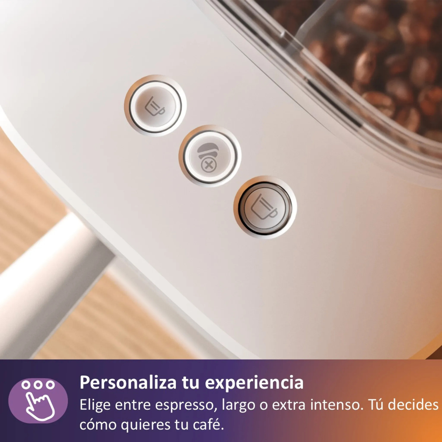 Cafetera con botones para espresso, largo, extra fuerte. Granos de café visibles.