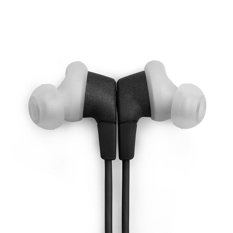 Dos auriculares blancos y negros con puntas de silicona transparentes, dispuestos simétricamente.