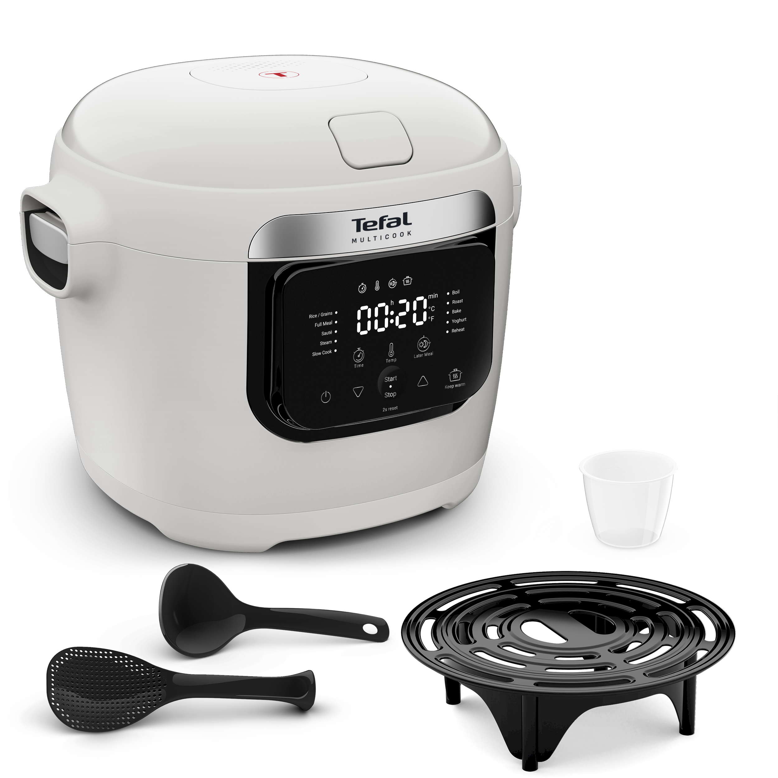 Egy fehér Tefal multikonyha edény tartozékokkal, mérőpohárral, kanállal és párolókosárral.