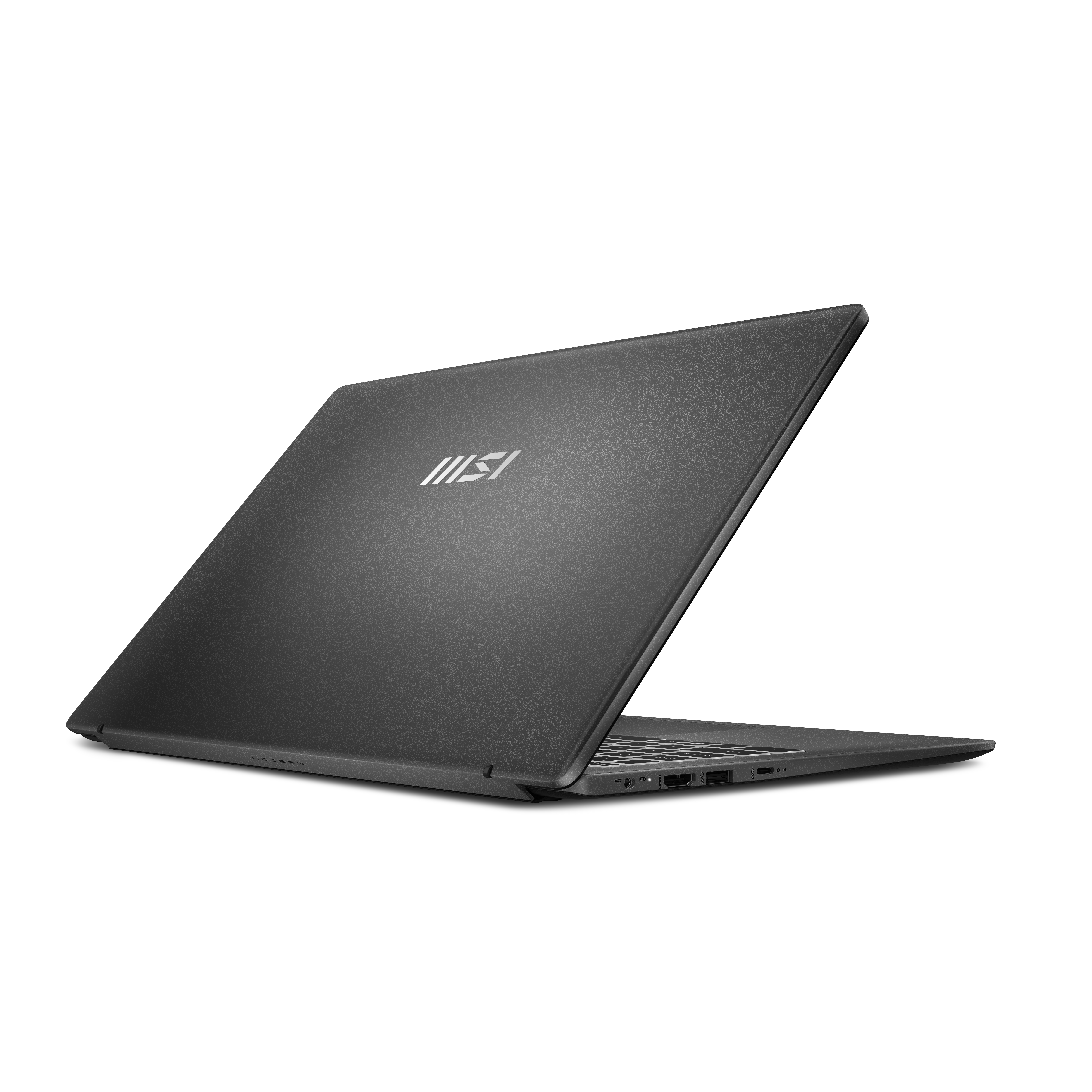 Un ordinateur portable fermé et sombre avec le logo MSI sur le capot.