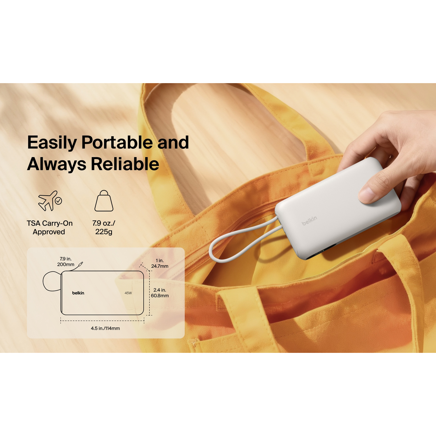 White Belkin power bank being placed into an orange tote bag. Dimensions shown.
