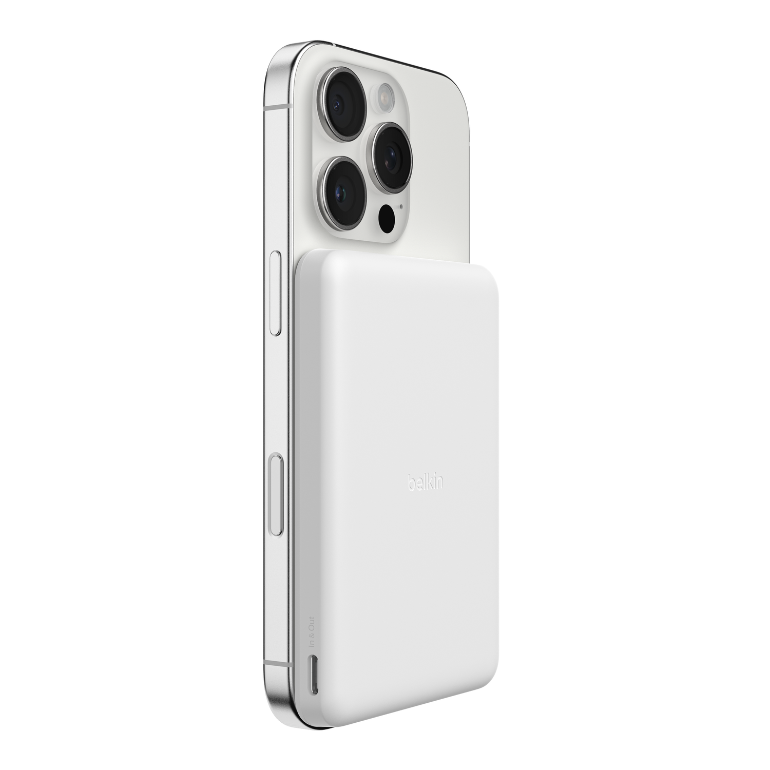 A white battery pack is attached to the back of a white iPhone.
