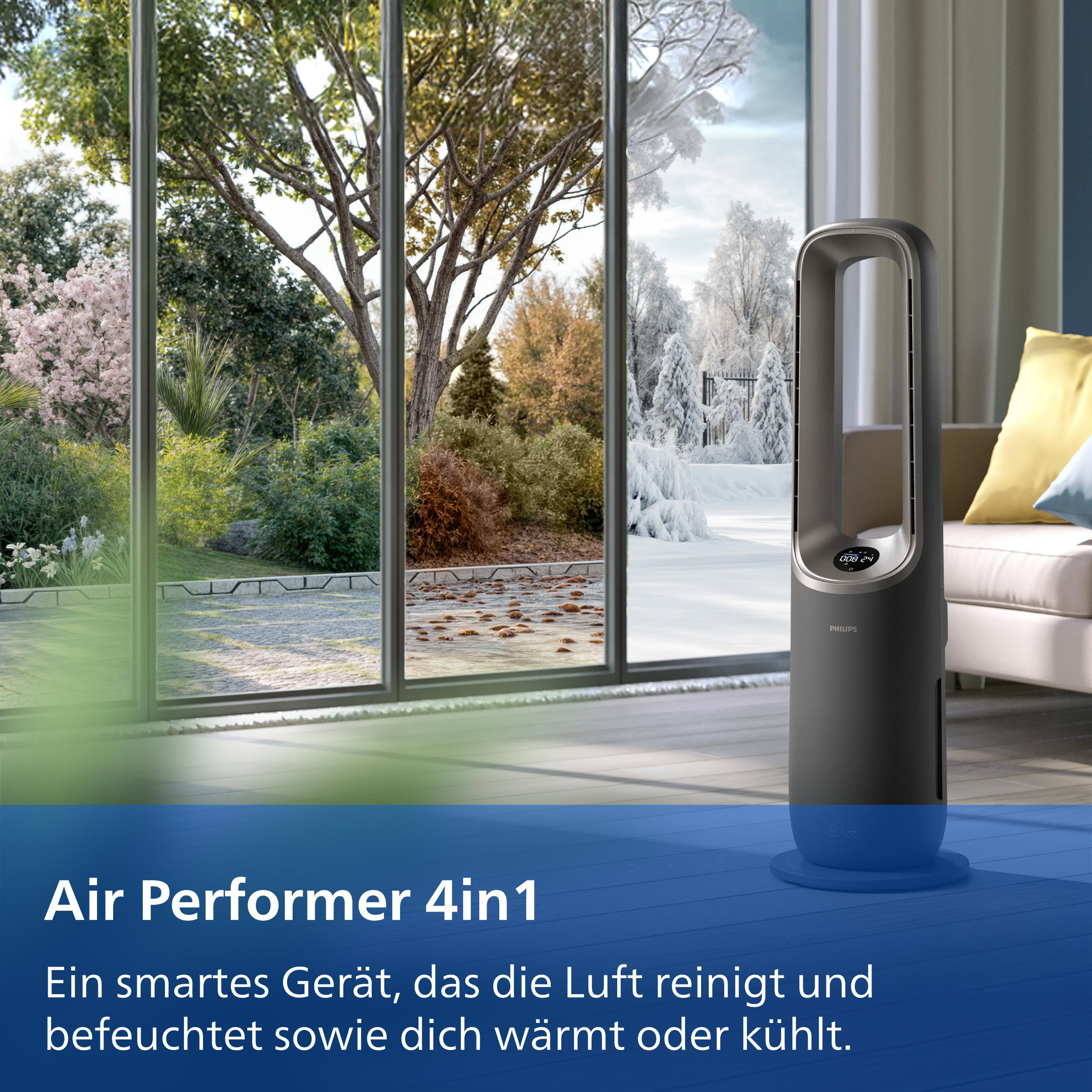 Ein dunkler Turmlüfter steht neben einem Fenster mit Blick auf einen Garten.