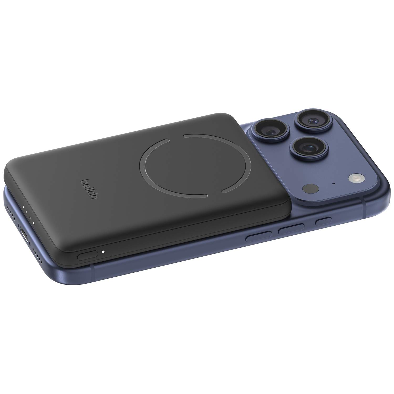 A black Belkin magnetic power bank attached to the back of a blue iPhone.