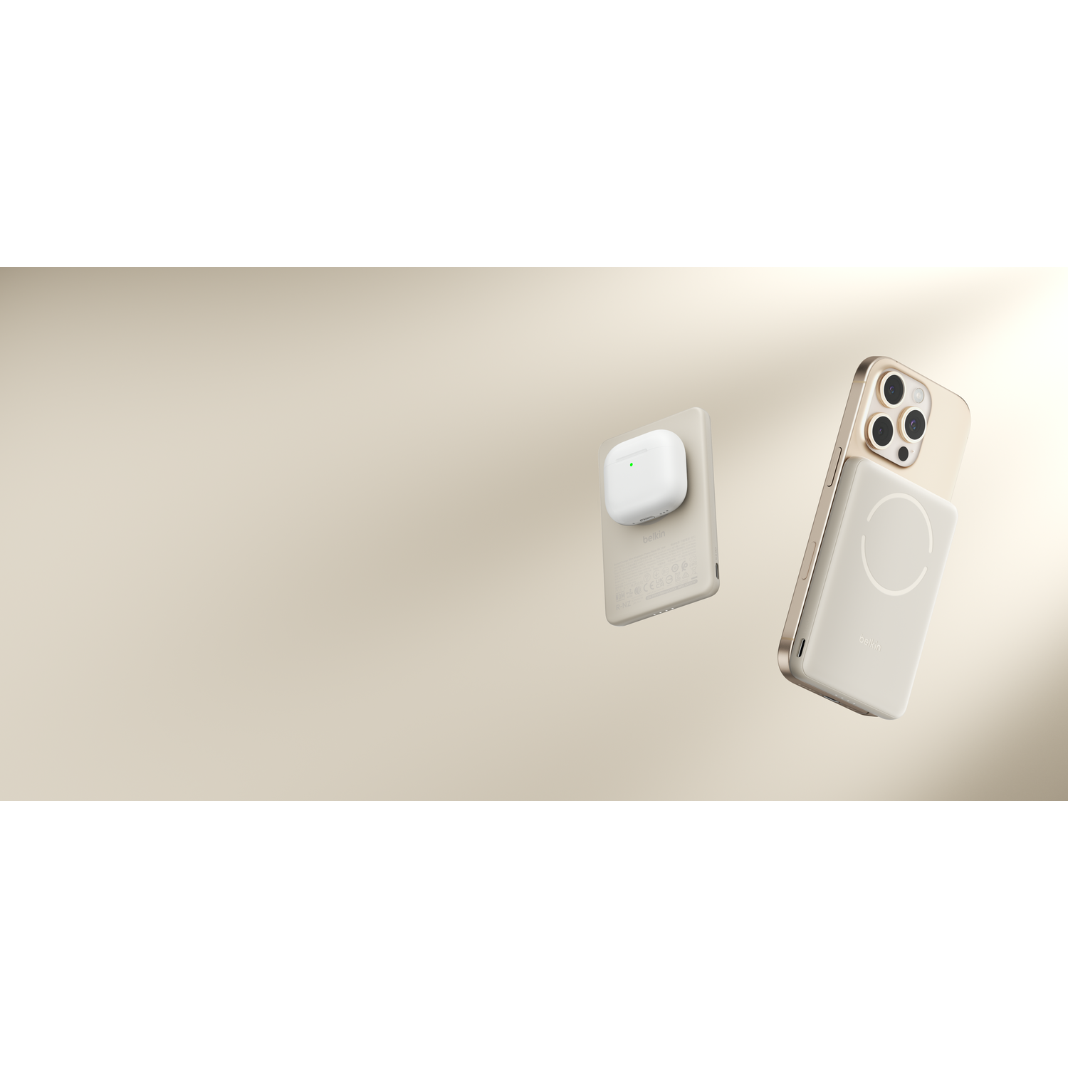 A white charging case with a green light and a gold MagSafe battery for an iPhone.
