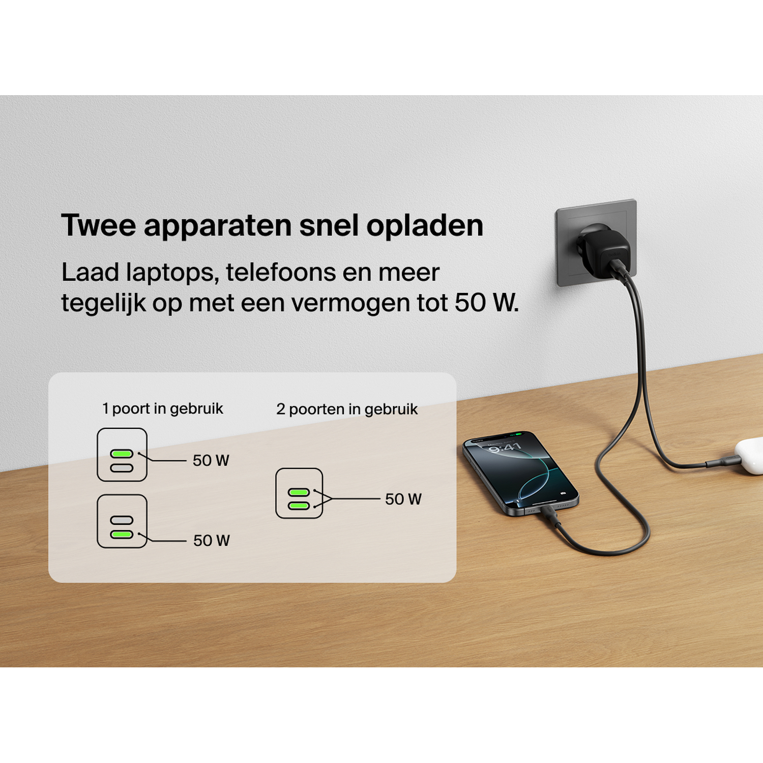 A charger powers a phone and a white device. Display shows 50W.