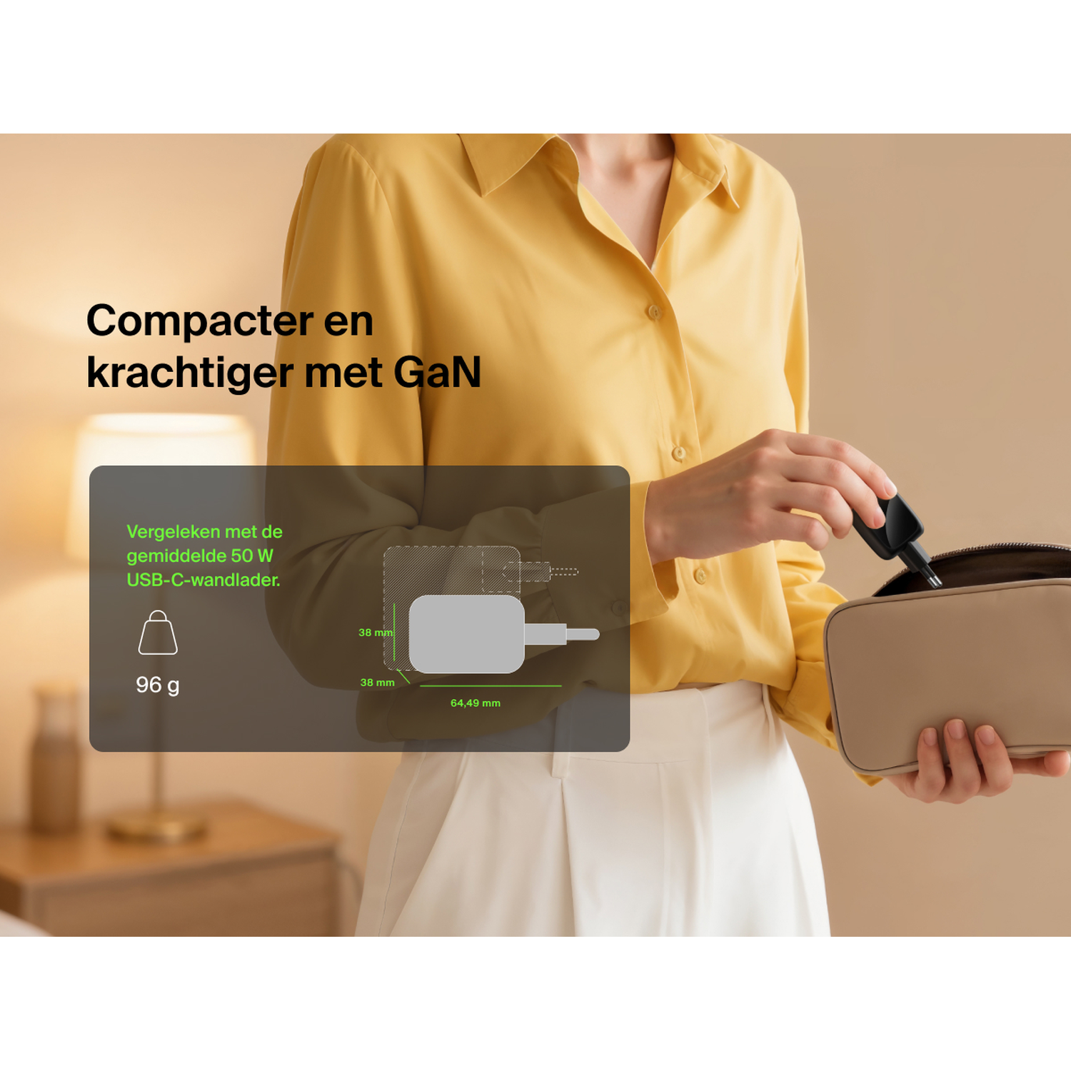 Woman packing compact GaN charger; 38x38x64mm, 96g.