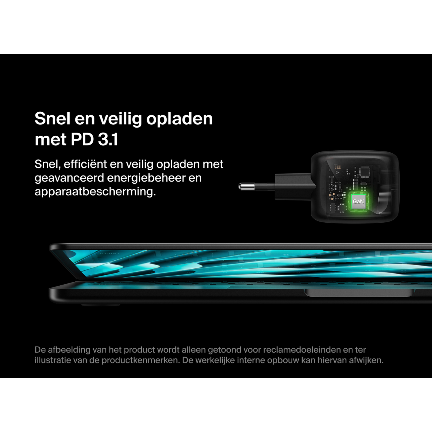 Black charger with GaN chip and open laptop on black background.