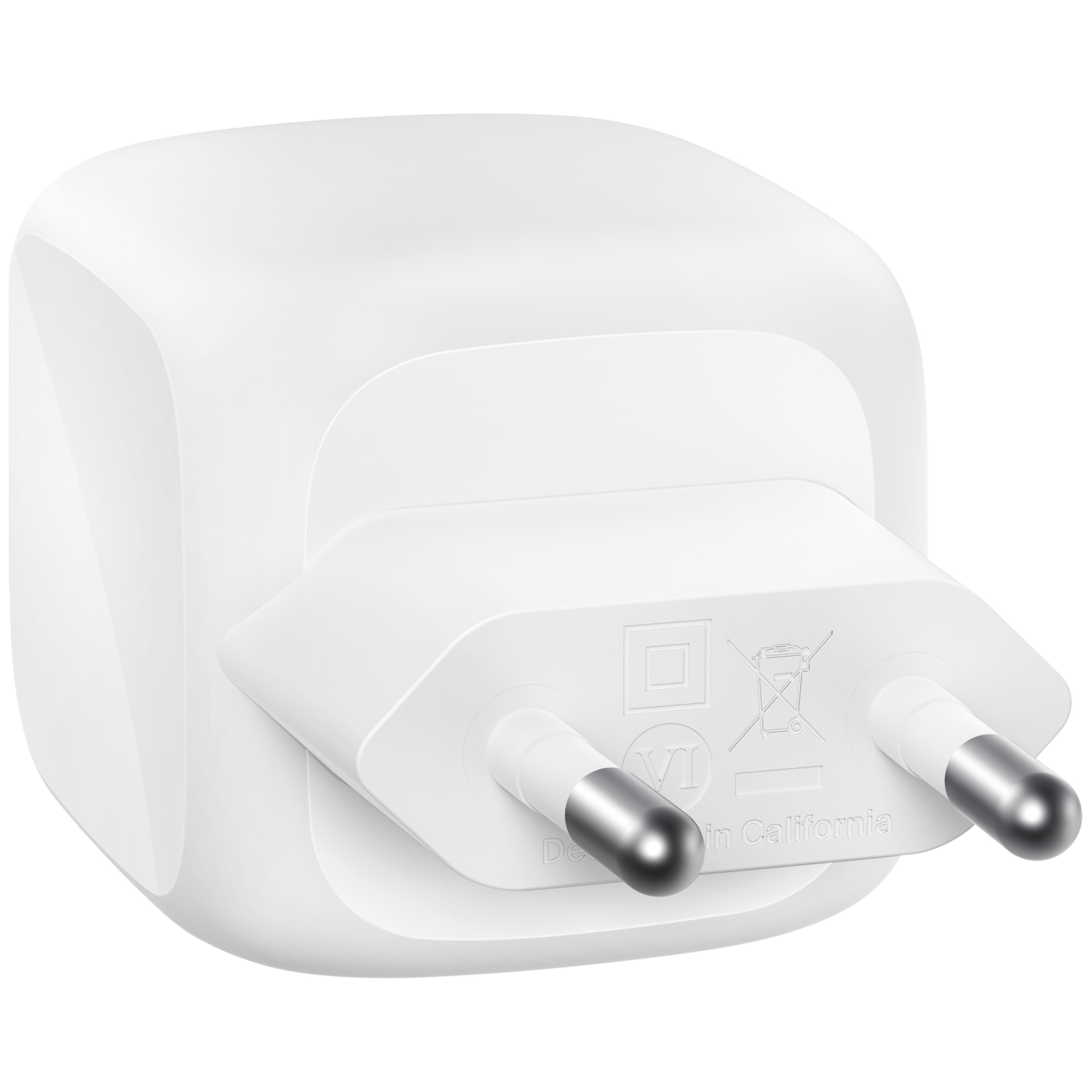 A white power adapter with two round metal prongs and markings.