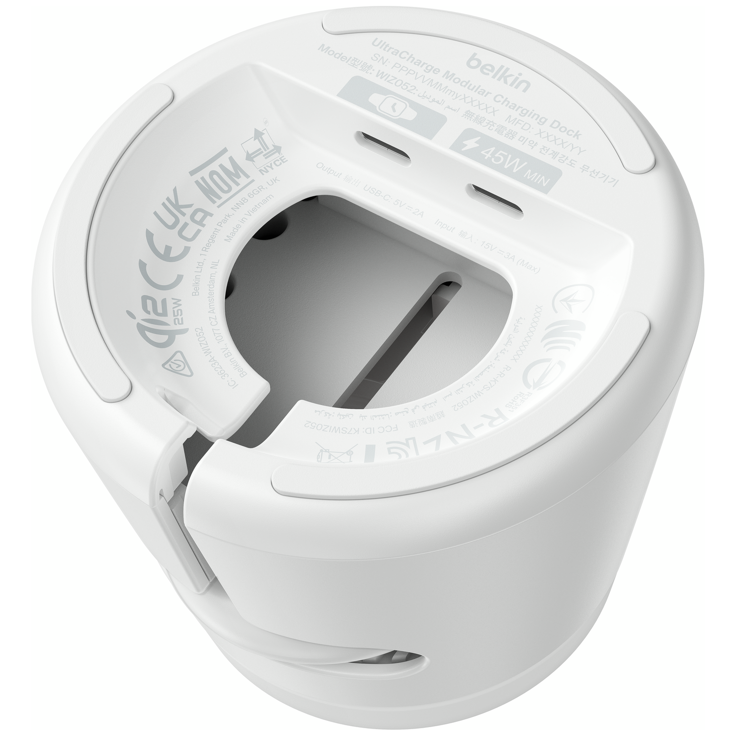 White Belkin charging dock with labels for model, serial number, and power (45W).