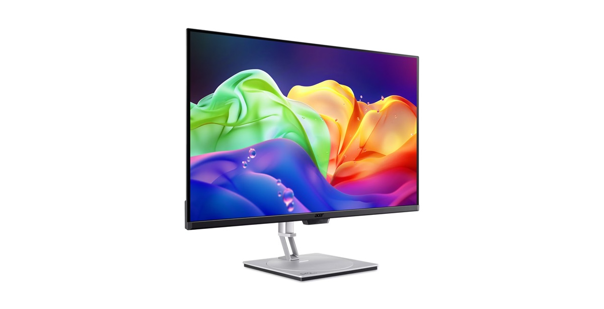 Egy Acer monitor színes, áramló mintával a képernyőn.
