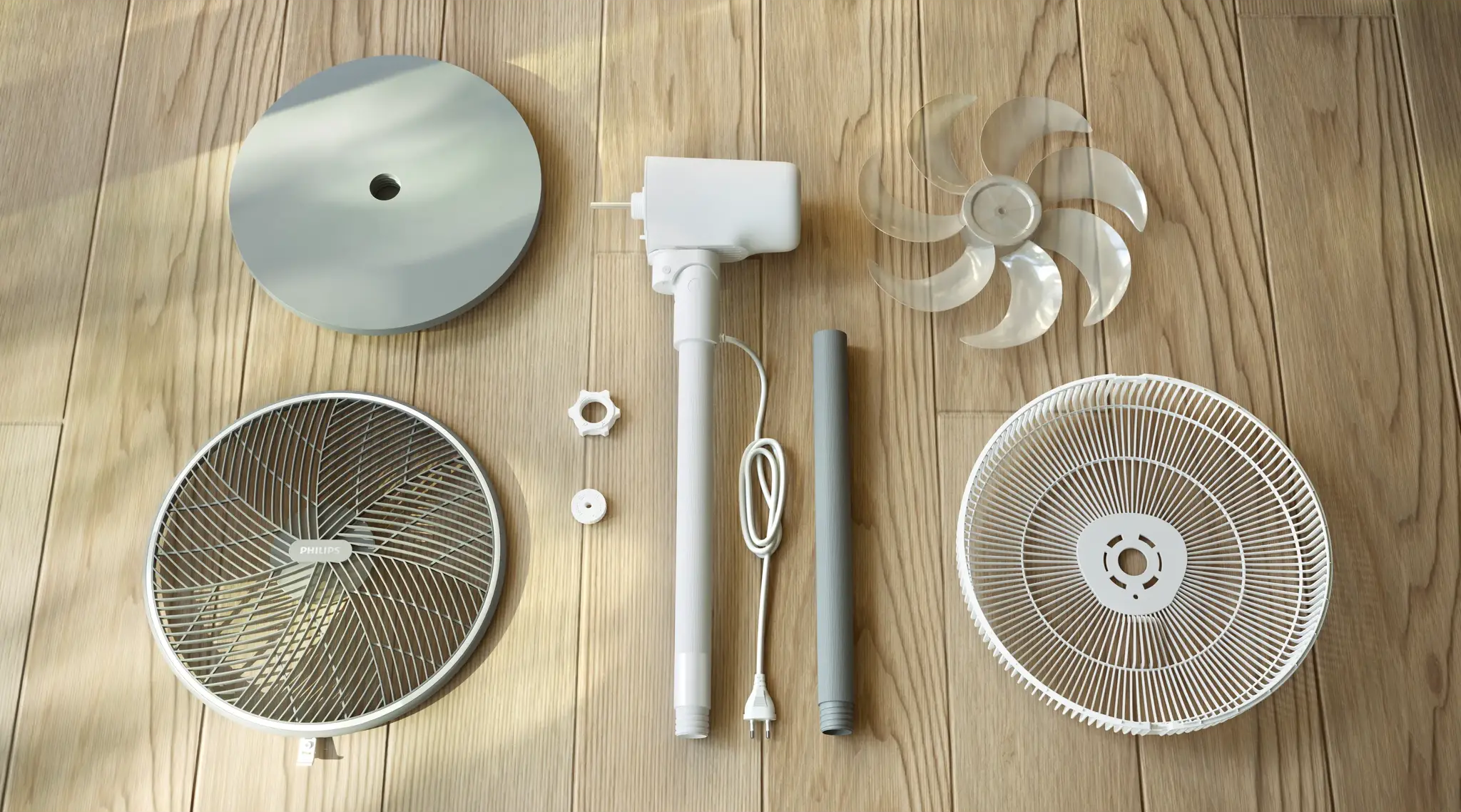 Einzelteile eines Standventilators auf Holzboden: Basis, Gestell, Motor, Flügel und Schutzgitter.