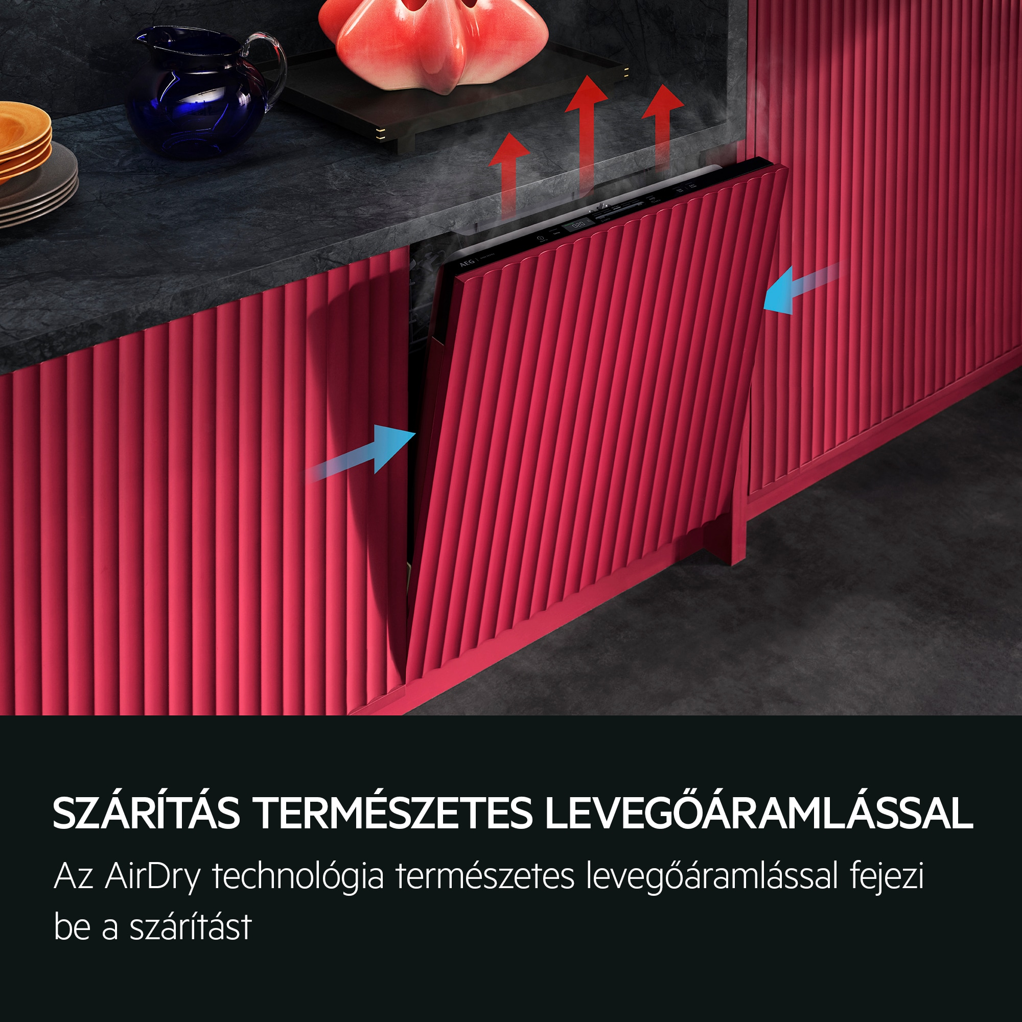 Piros mosogatógép nyitott ajtóval, légáramlást mutatva.