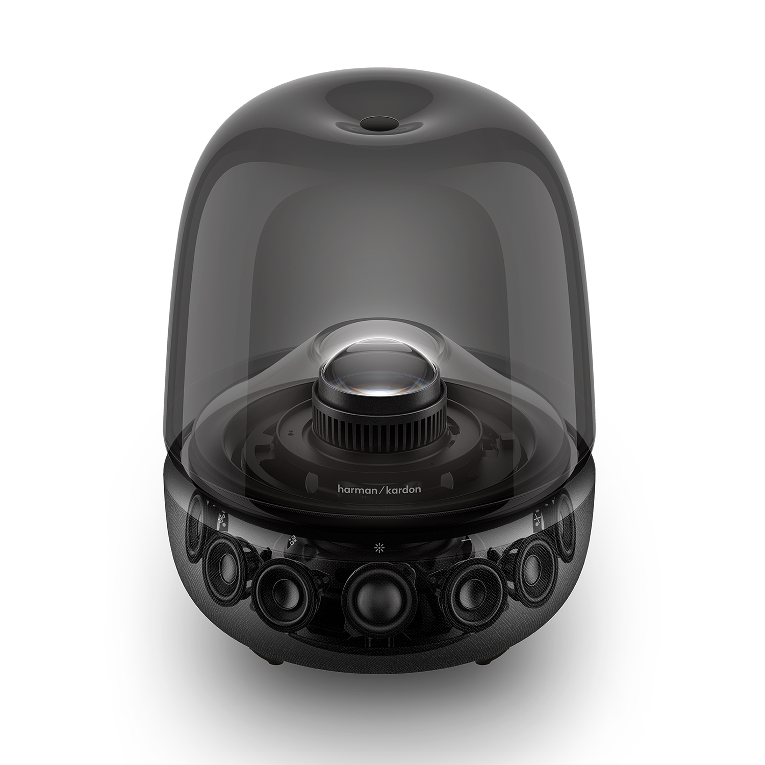 Un altavoz negro transparente con drivers visibles y el logo de Harman Kardon.