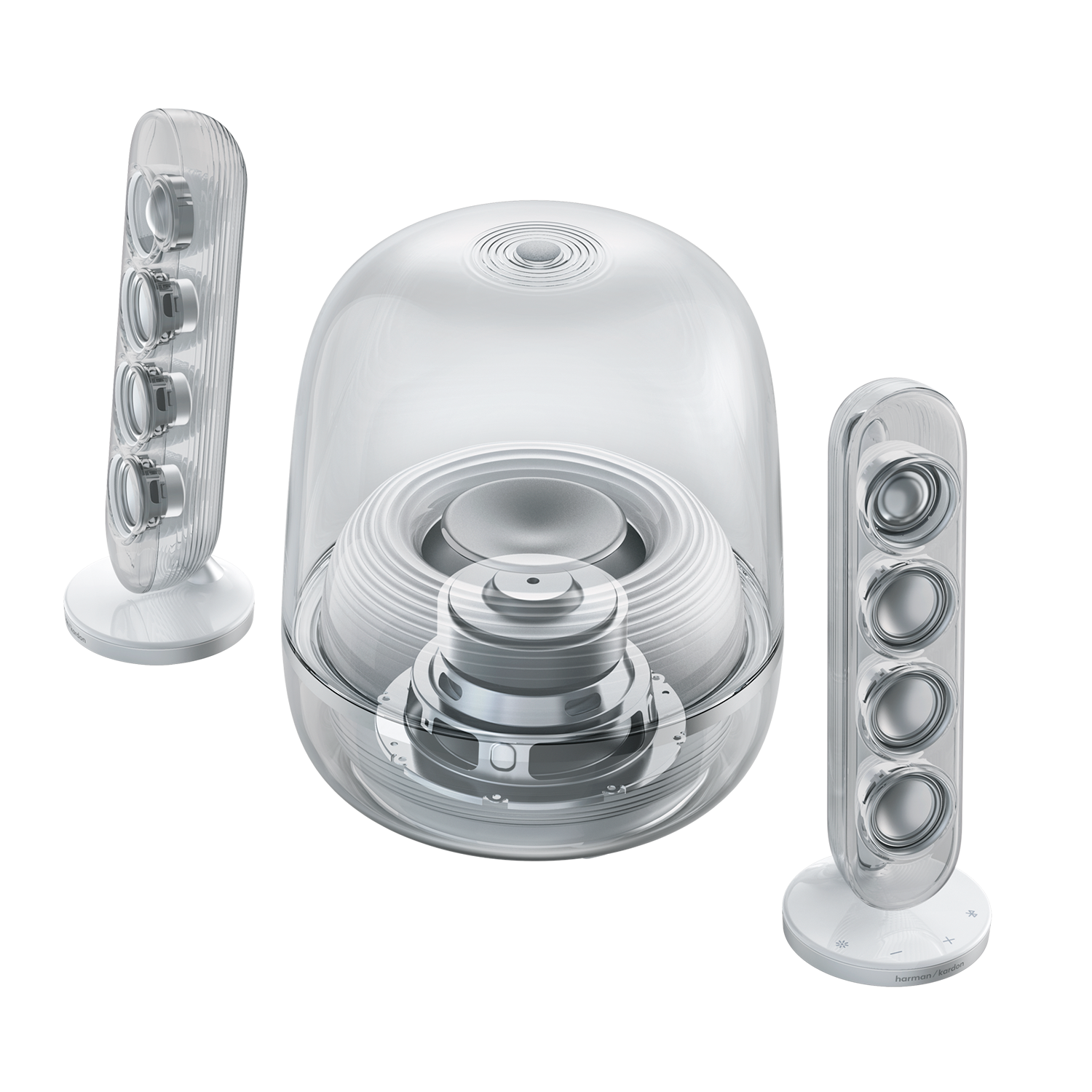 Tres altavoces transparentes con detalles plateados sobre fondo blanco.