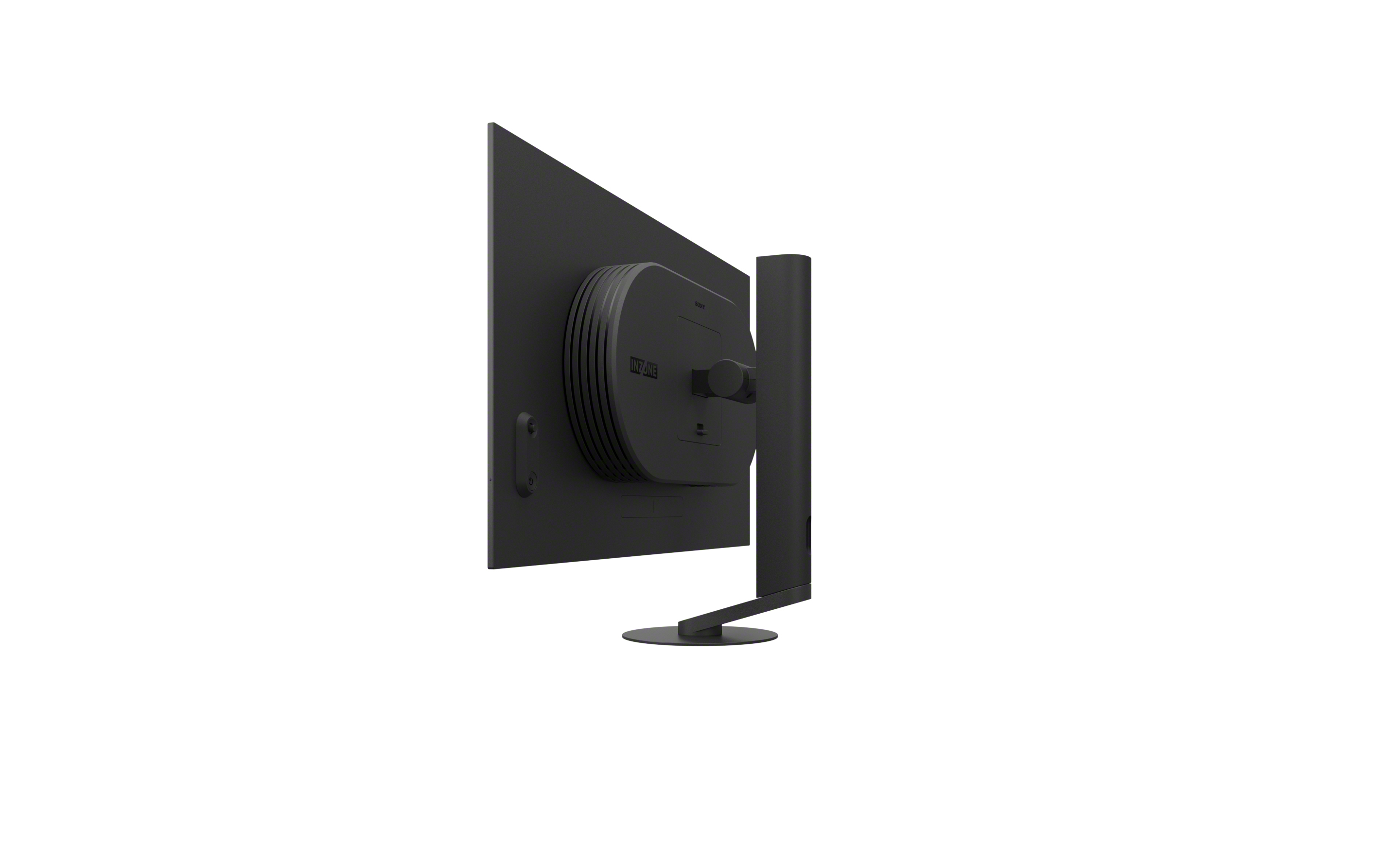 Vista posteriore di un monitor nero con base rotonda e supporto verticale.
