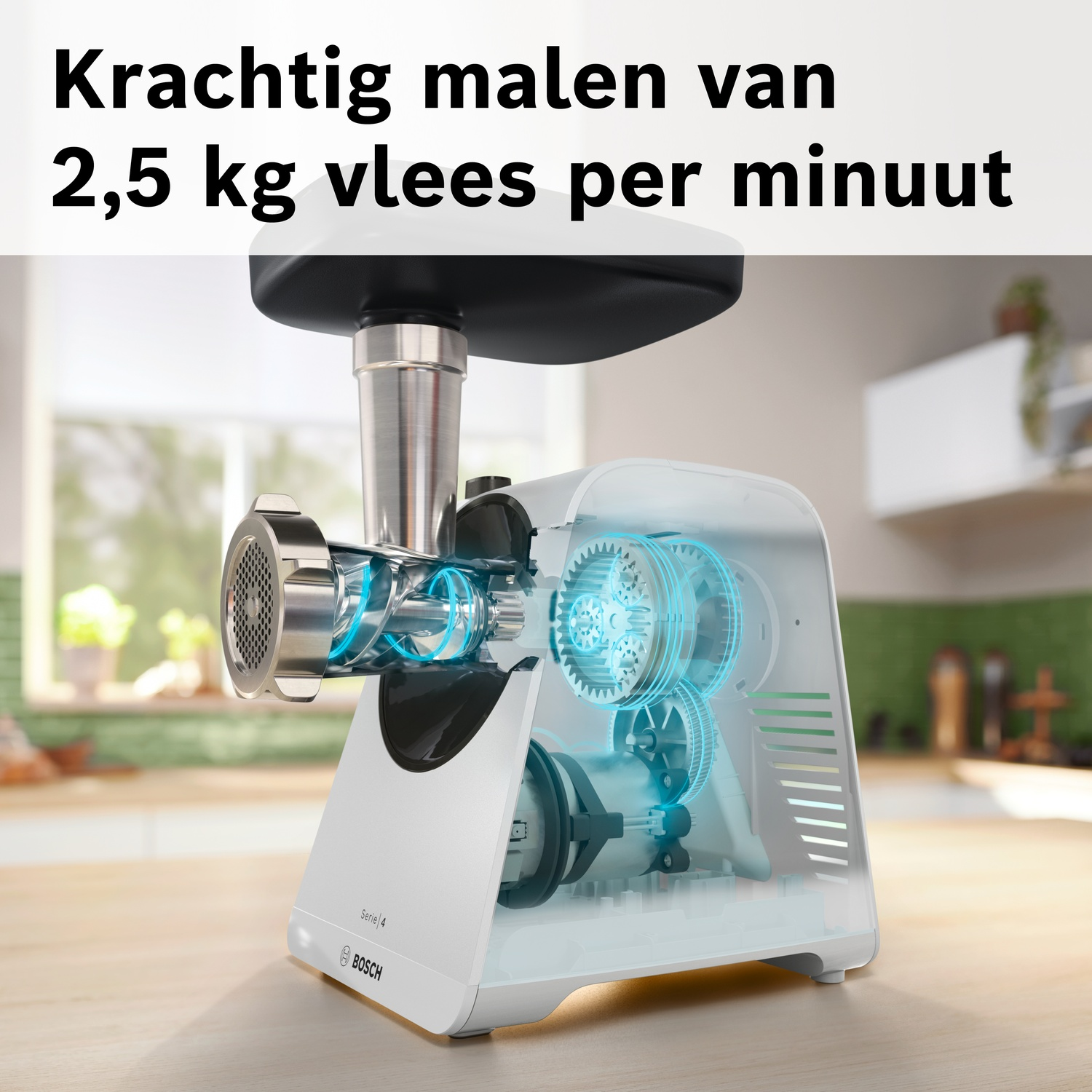 Een witte vleesmolen met transparante behuizing die interne tandwielen toont.
