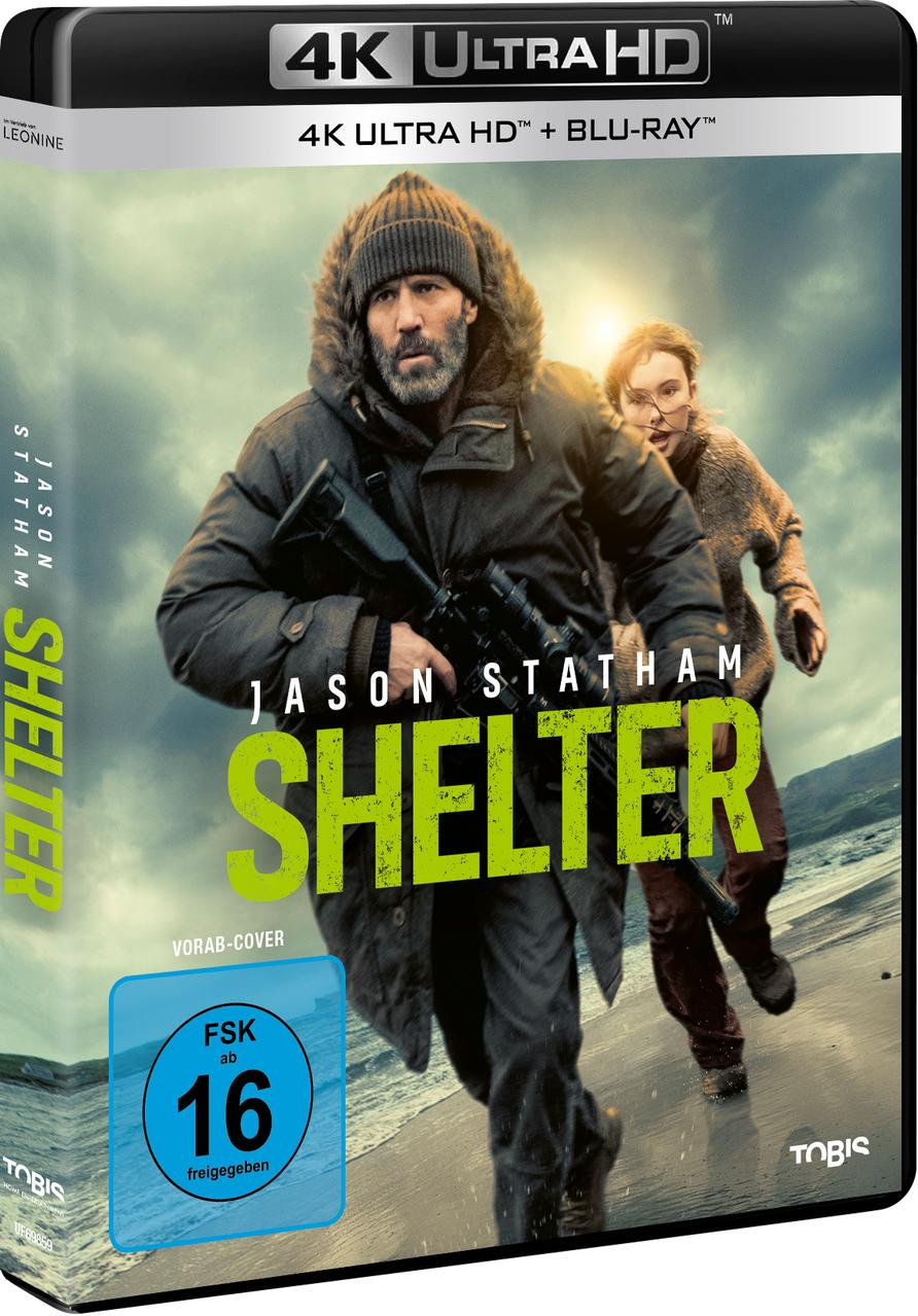 Mann mit Waffe und Kind laufen am Strand. "Shelter" 4K UHD Blu-ray Cover.
