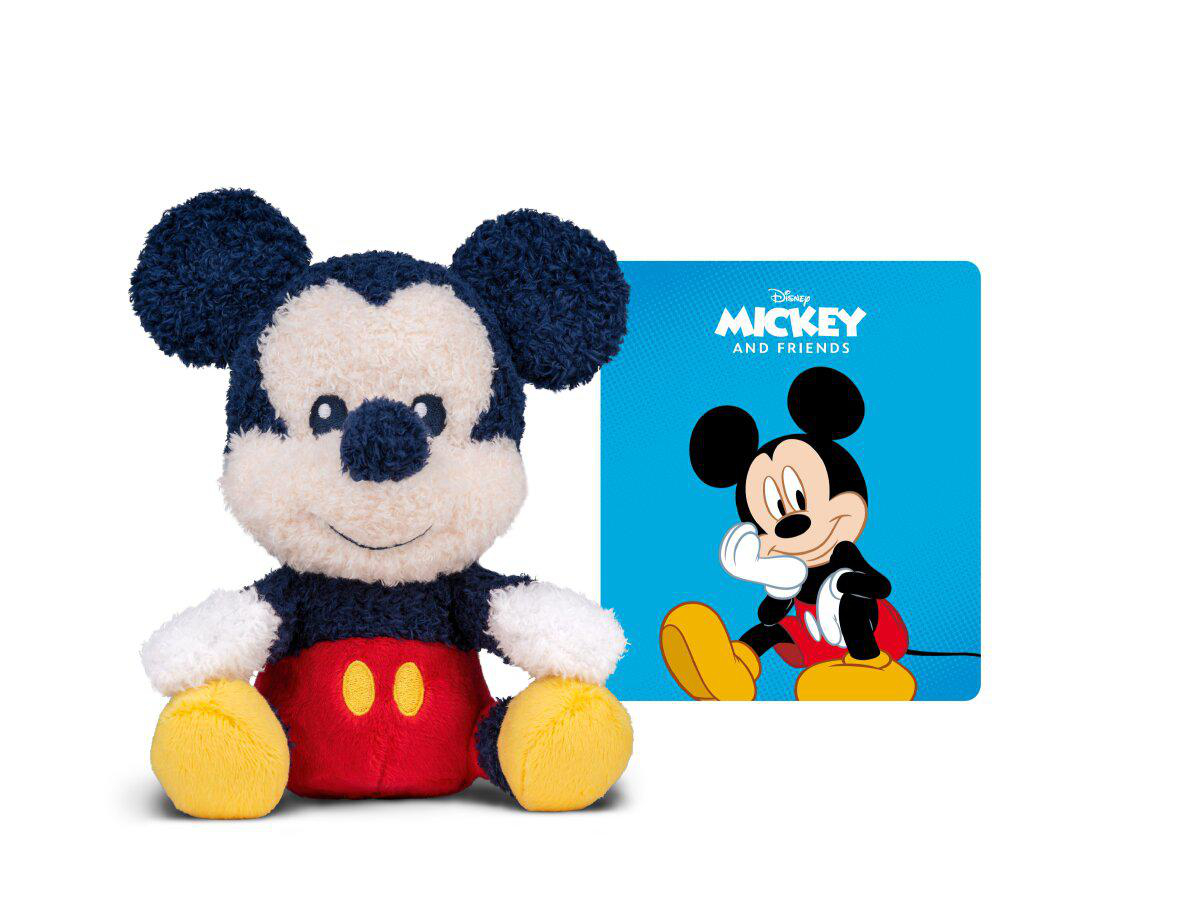 Plüschtier von Mickey Maus mit seinem klassischen roten Hosenträger und gelben Schuhen.