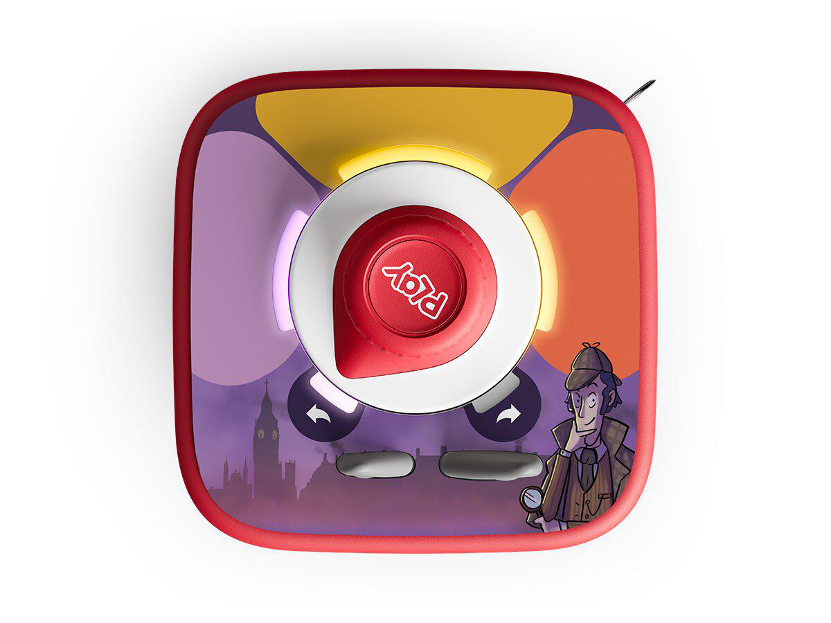 Ein roter Spielknopf auf einem bunten Gerät mit Detektiv- und London-Motiv.