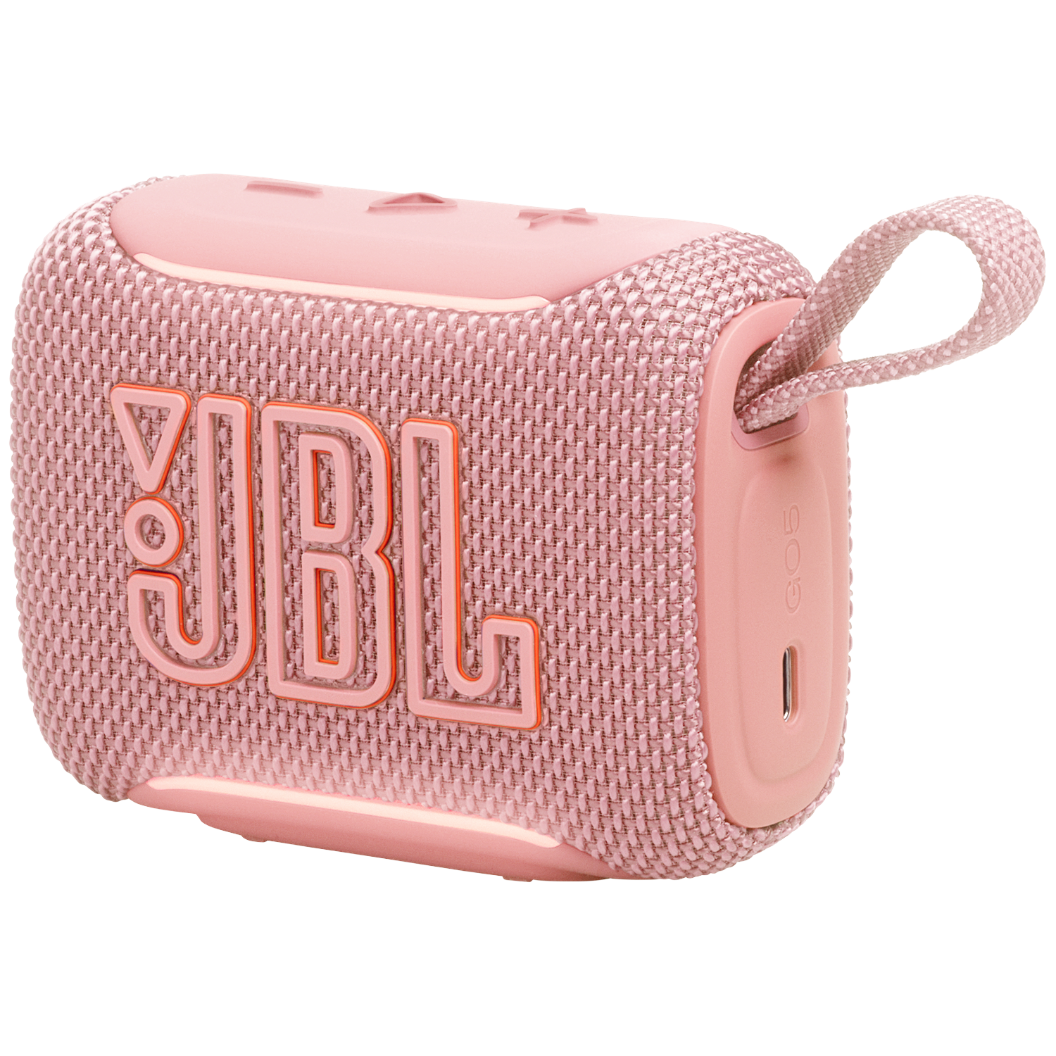 Een roze JBL draagbare speaker met stoffen hoes en oranje JBL-logo.