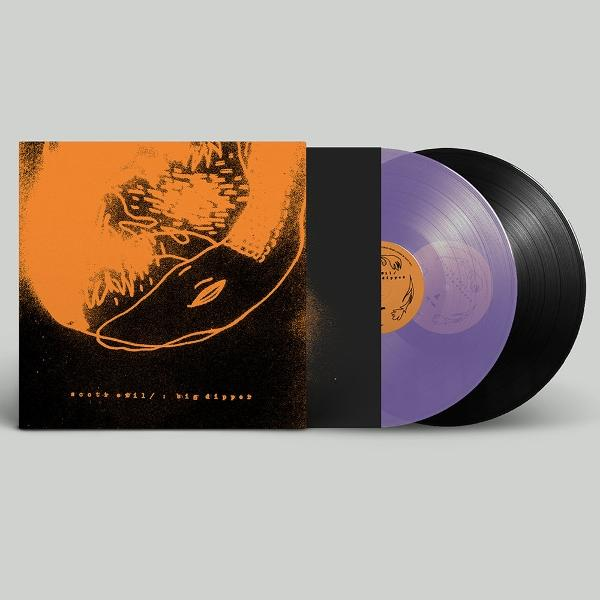 Schwarzes Vinyl mit orangefarbenem Cover, das eine stilisierte Schnauze zeigt.