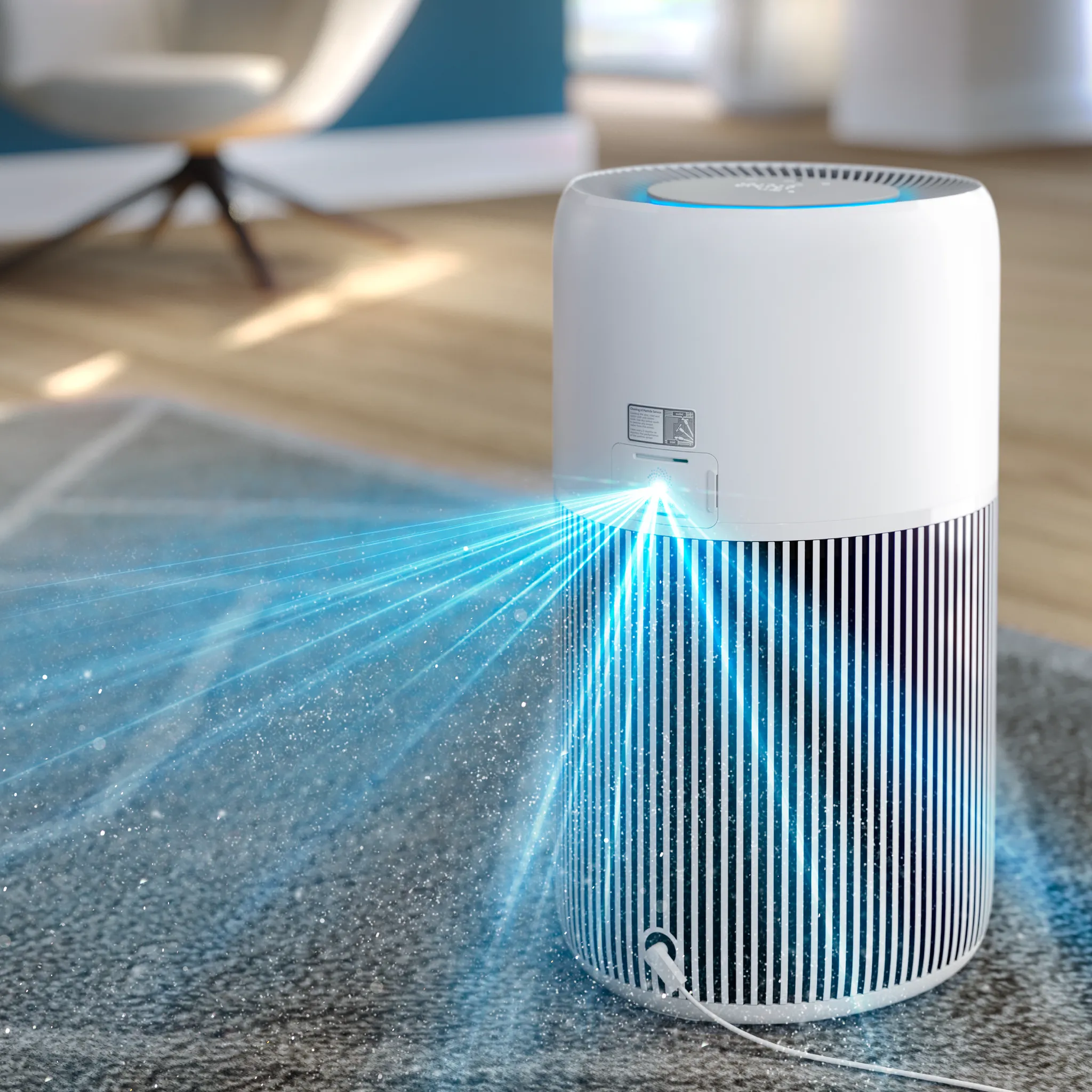 Un purificatore d'aria bianco emette raggi blu con particelle.