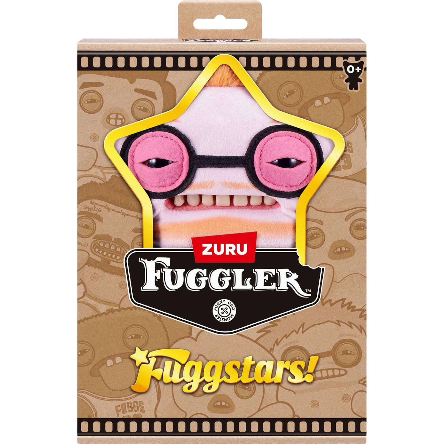 Caja de juguete Fuggler con personaje de felpa en forma de estrella con gafas y detalles rosas.