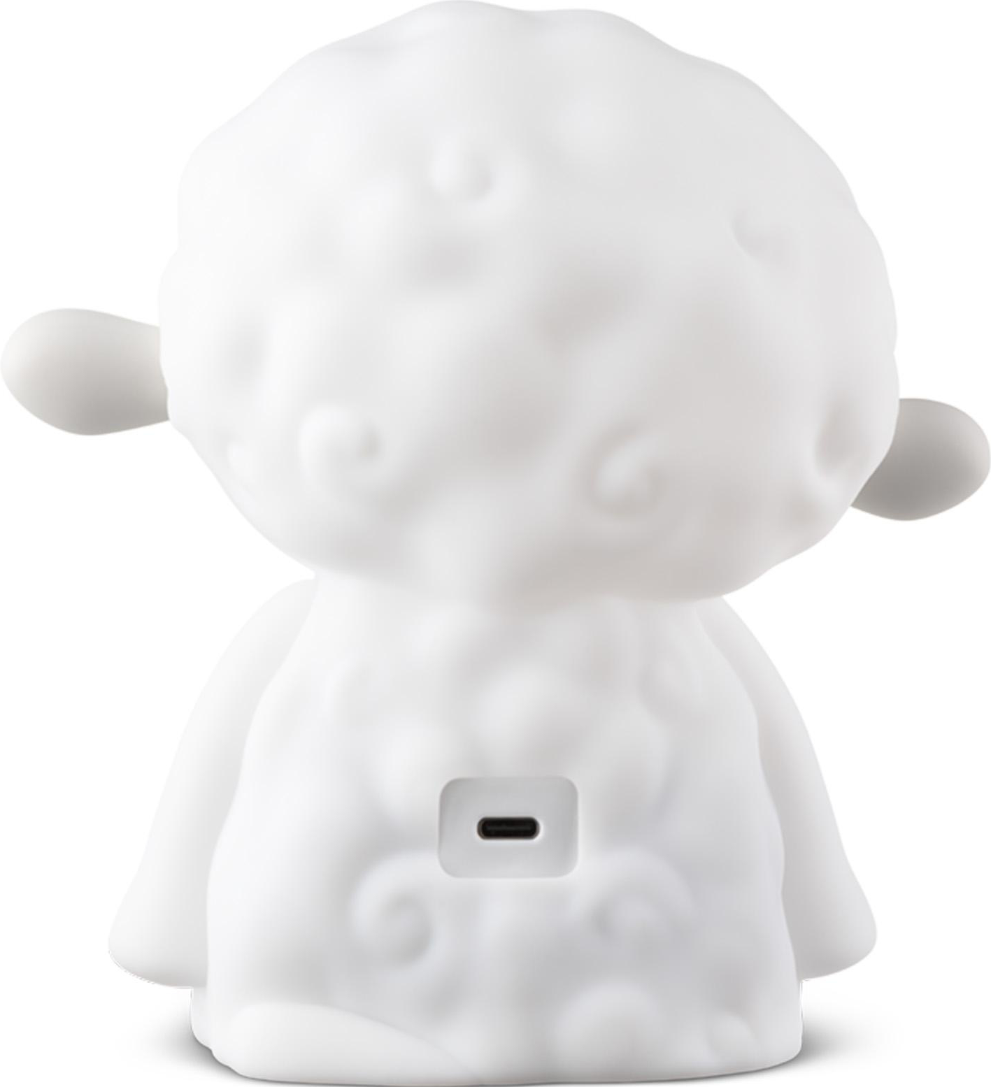 Una luce notturna bianca a forma di pecora con porta USB sul retro.
