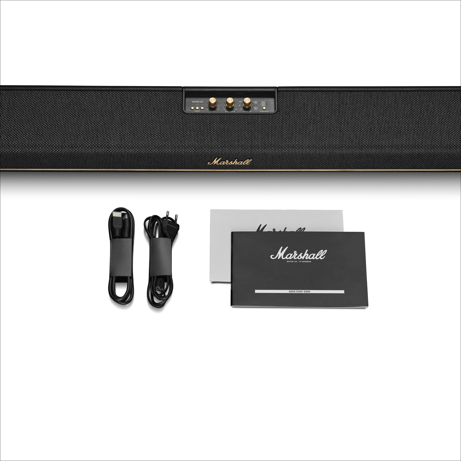 Marshall soundbar met kabels en handleiding op witte achtergrond.