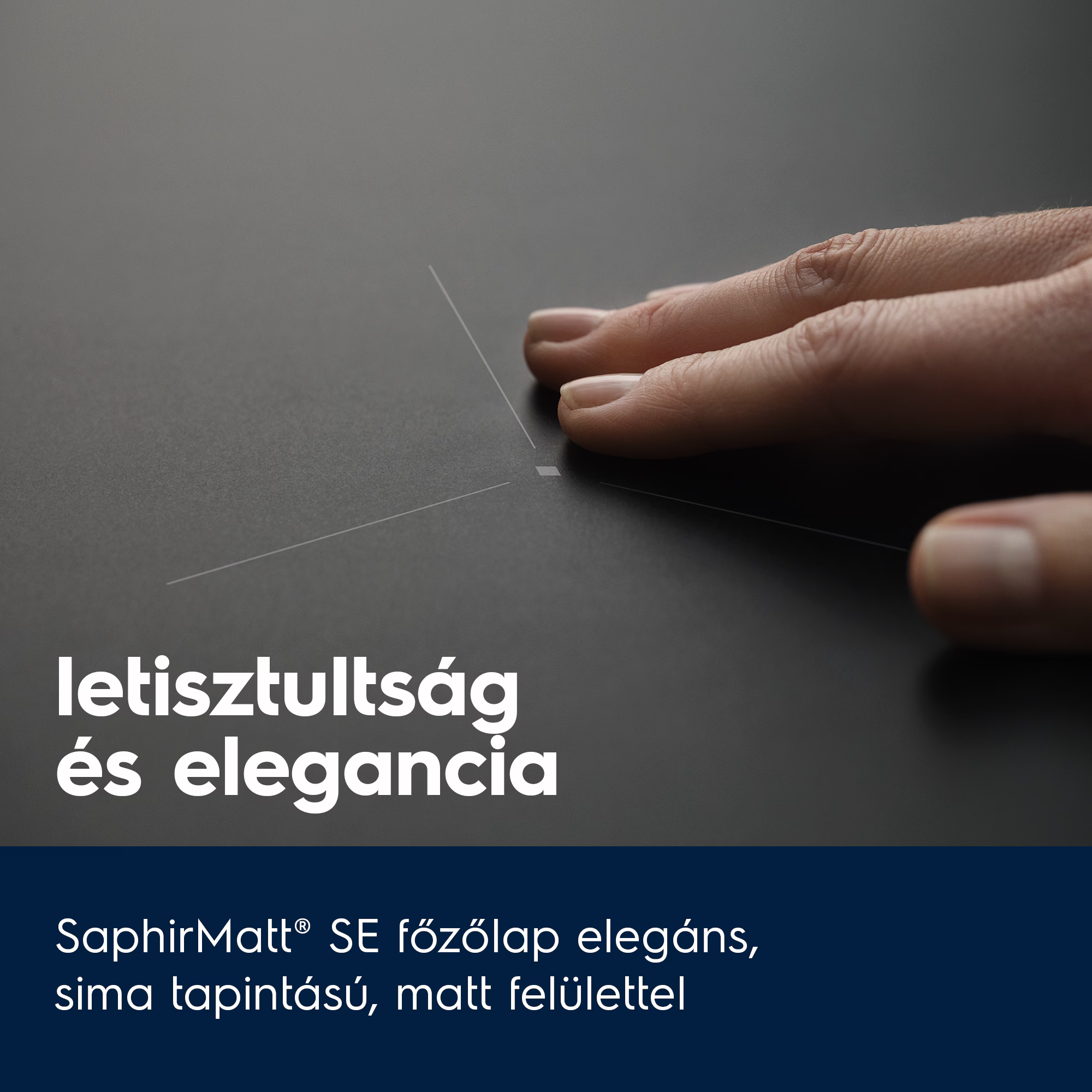 Egy kéz érint egy sötét főzőlapot fehér vonalakkal.