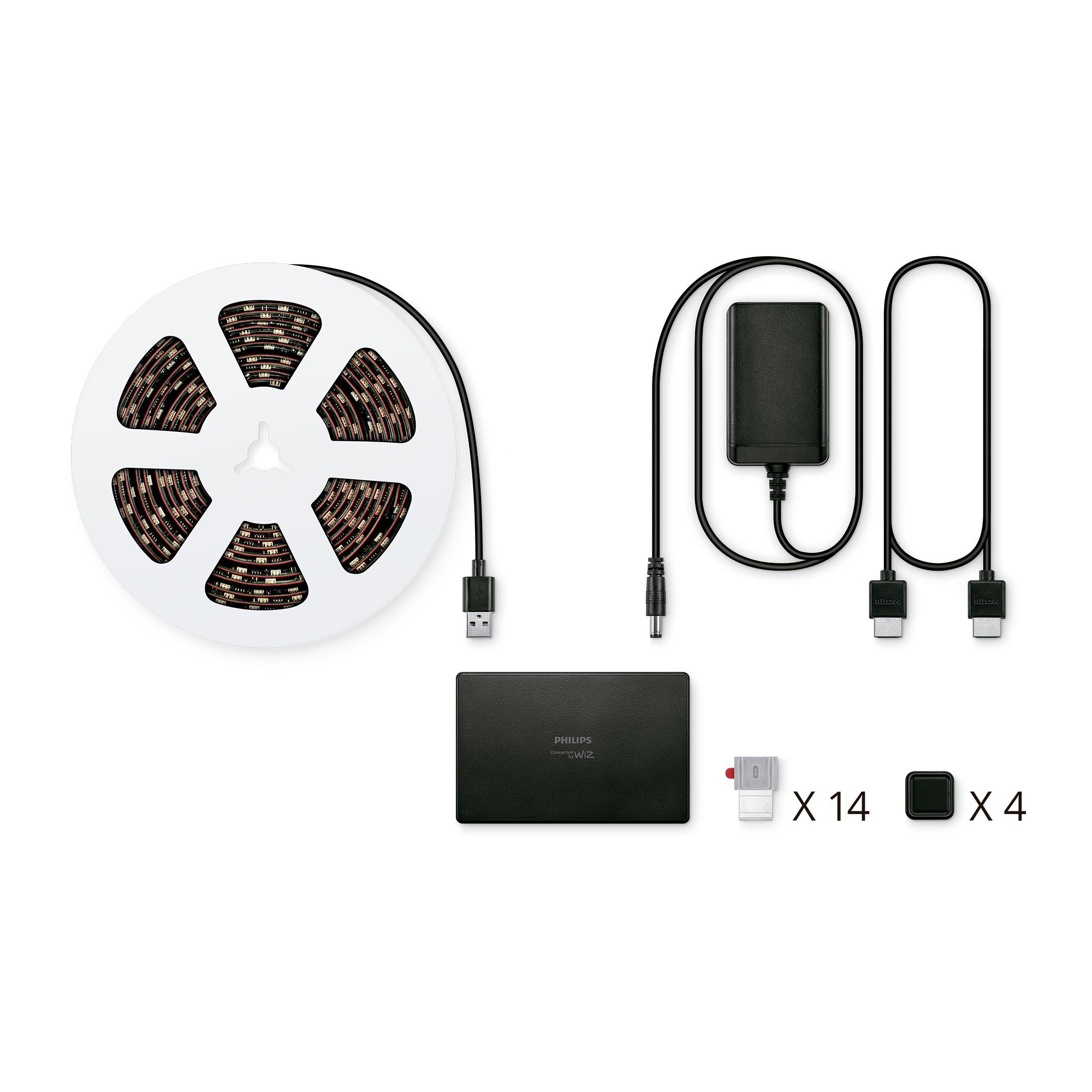 Ein Philips Hue LED-Streifen, Netzteil, Steuerbox und Verbinder sind ausgelegt.