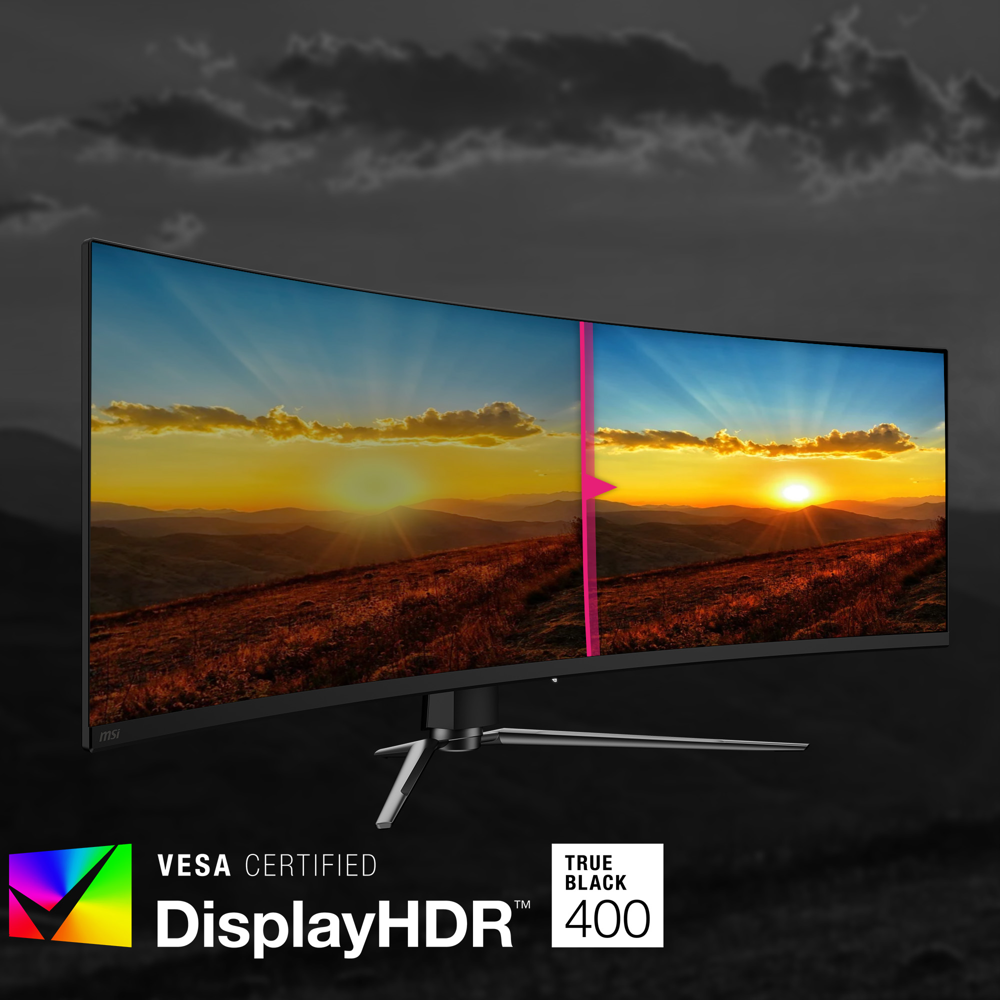 Ein breiter Gaming-Monitor zeigt eine sonnenuntergangslandschaft mit Wolken. VESA-zertifiziert.